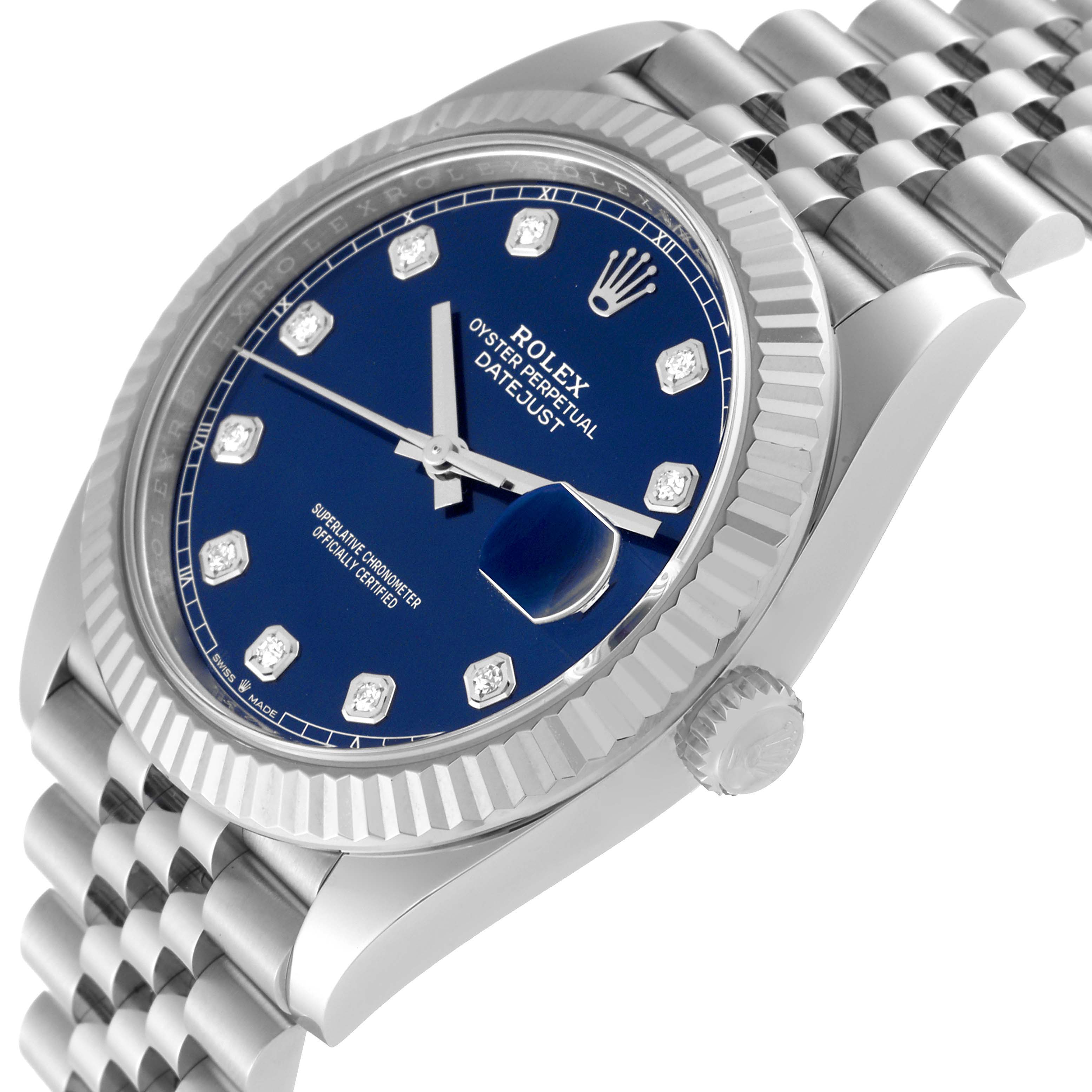 This image shows a close-up side angle of a Rolex Datejust 41 126334 Men
s Stainless Steel Blue Dial 126334 Men
s Stainless Steel Blue Dial watch, highlighting its blue dial, fluted bezel, and Jubilee bracelet.