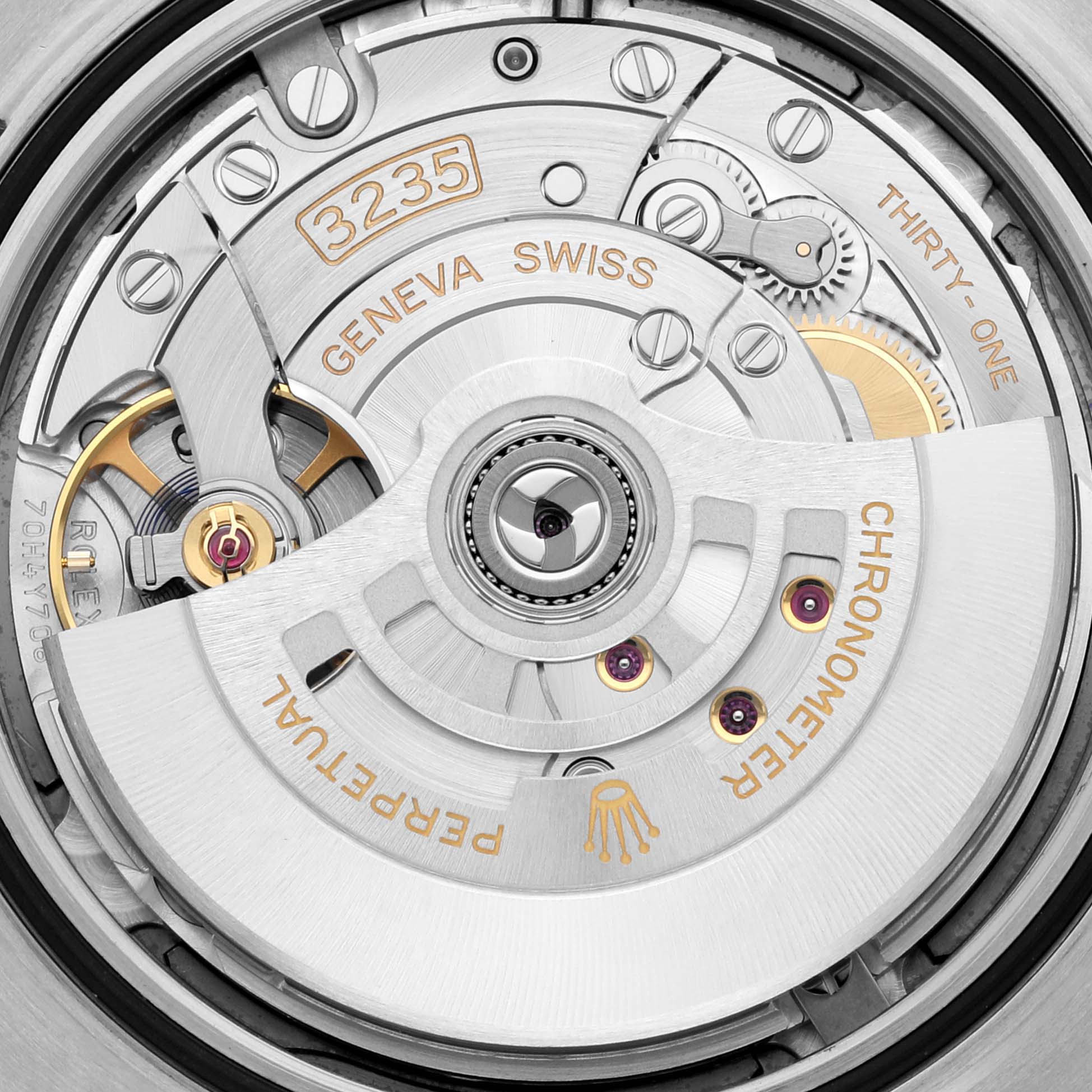 The image shows the intricate movement and internal mechanism of a Rolex Datejust 41 126334 Men
s Stainless Steel Blue Dial 126334 Men
s Stainless Steel Blue Dial watch from a top-down angle.