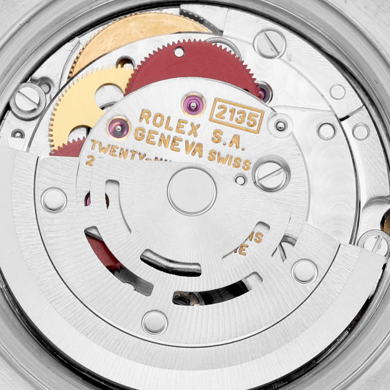 This image shows a close-up of the movement mechanism of a Rolex Datejust 69173 Women's Steel and Gold (two tone) Champagne Dial 69173 Women's Steel and Gold (two tone) Champagne Dial watch, focusing on its intricate gears and components.