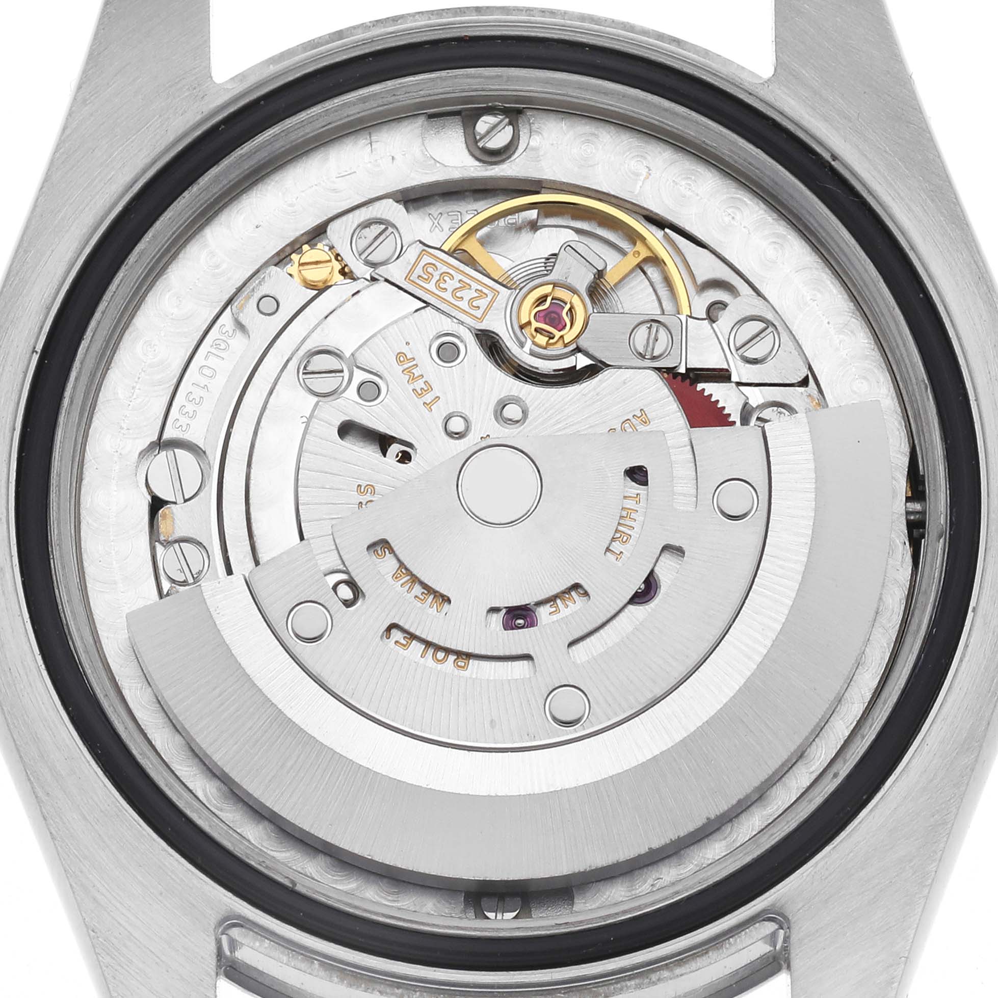 This image shows the movement from the back angle of a Rolex Mid-Size 178240 Women
s Stainless Steel Blue Dial 178240 Women
s Stainless Steel Blue Dial watch, highlighting the rotor and intricate components.