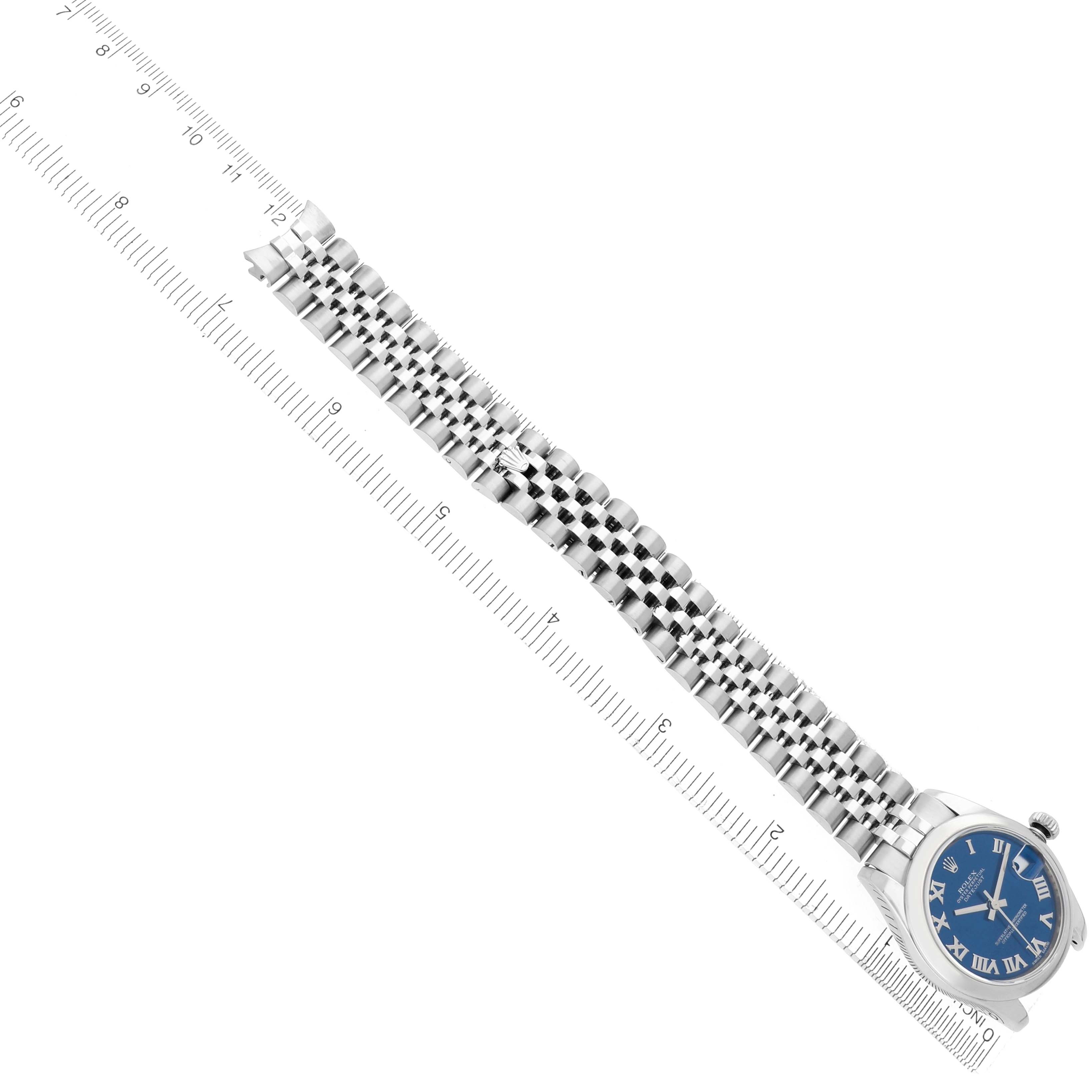 The Rolex Mid-Size 178240 Women
s Stainless Steel Blue Dial 178240 Women
s Stainless Steel Blue Dial watch is shown from a top view, highlighting the band and dial alongside a ruler for scale.