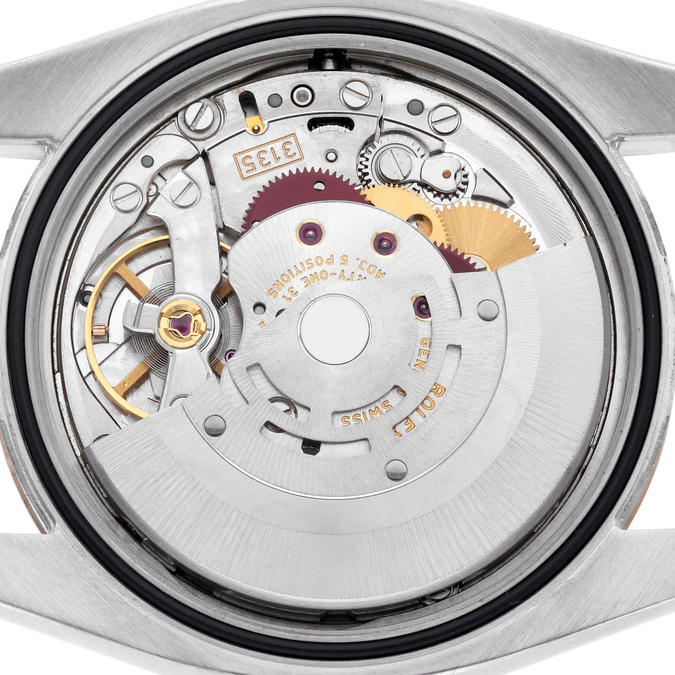 The image shows the back view of the Rolex Datejust 116231 Men
s Steel and Gold (two tone) Black Dial 116231 Men
s Steel and Gold (two tone) Black Dial watch
s inner mechanism, highlighting gears and parts of the movement.