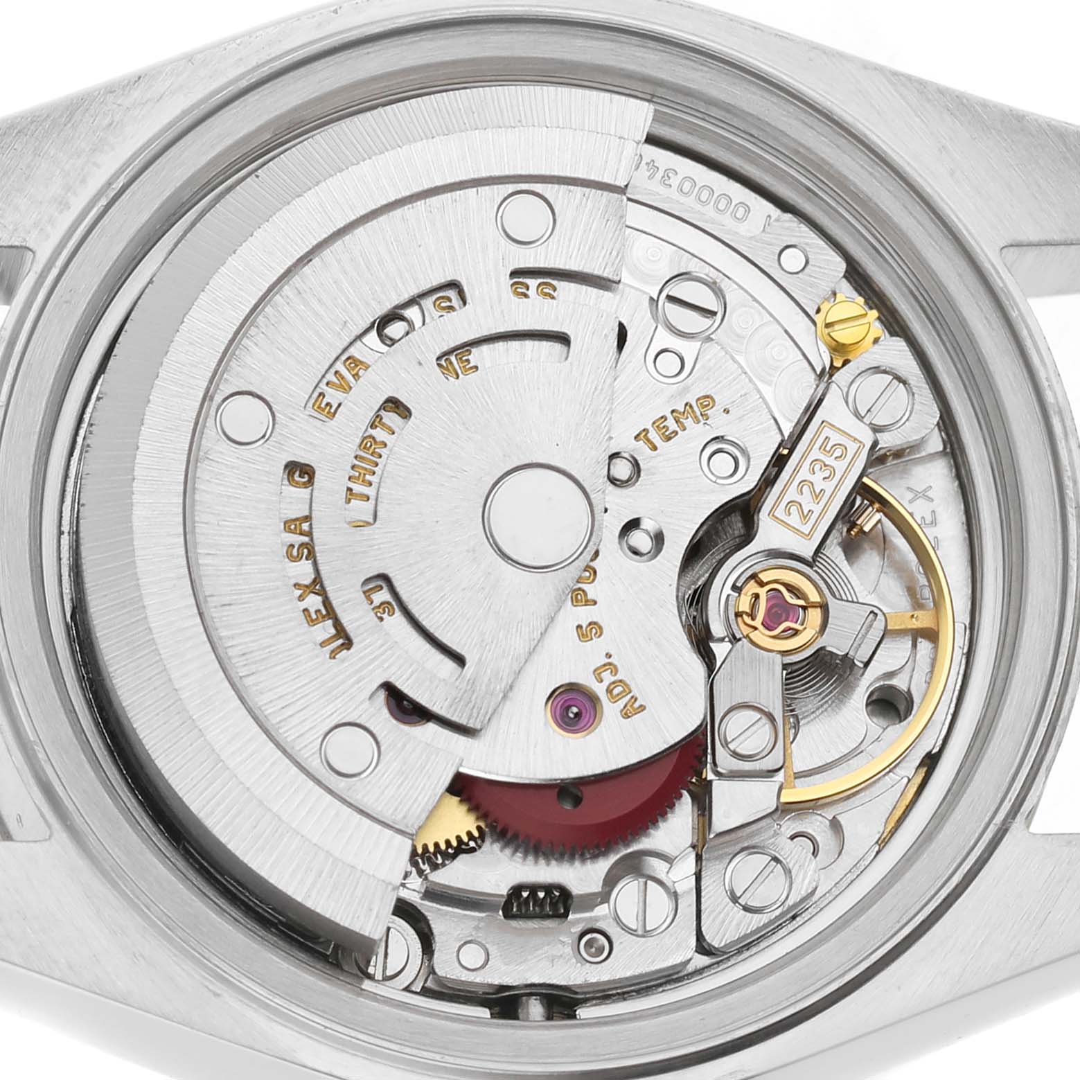 The image shows the movement of a Rolex Datejust 79173 Women's Steel and Gold (two tone) Champagne Dial, viewed from the back, highlighting its intricate components.