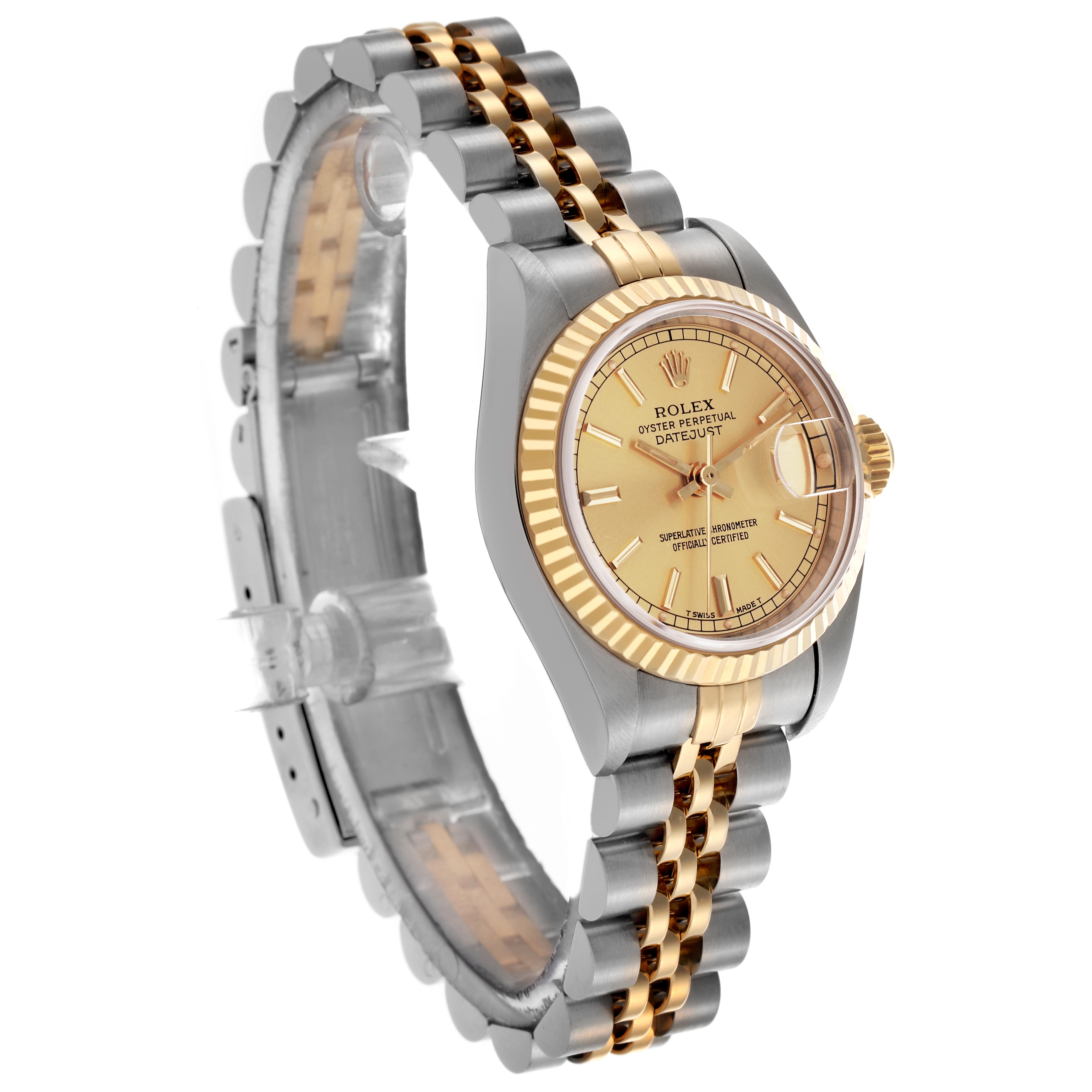 The Rolex Datejust 69173 Women
s Steel and Gold (two tone) Champagne Dial 69173 Women
s Steel and Gold (two tone) Champagne Dial watch is shown at an angled profile, highlighting the dial, bezel, bracelet, and crown.