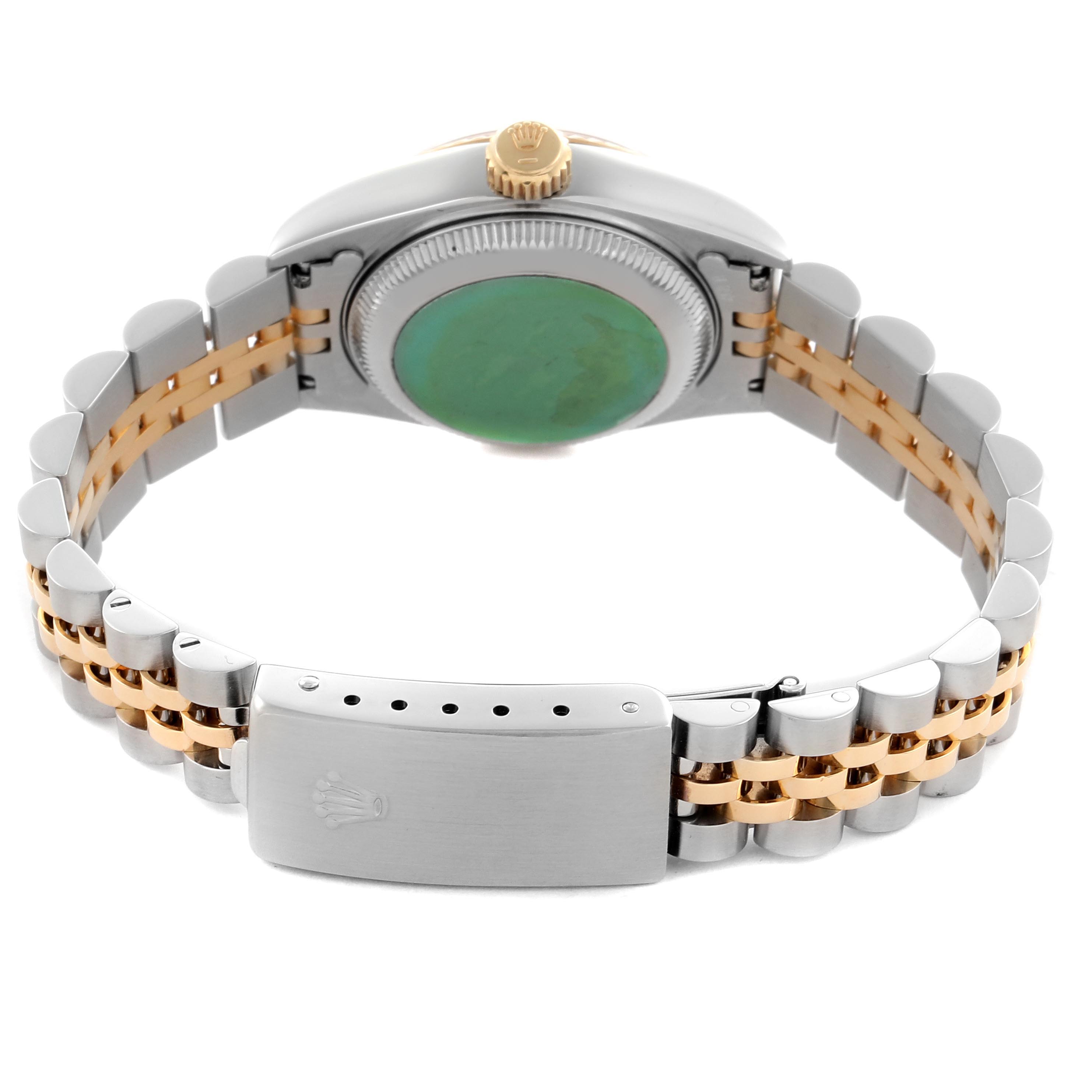 The image shows the back of a Rolex Datejust 69173 Women
s Steel and Gold (two tone) Champagne Dial 69173 Women
s Steel and Gold (two tone) Champagne Dial watch, highlighting its two-tone bracelet, case back, and clasp.