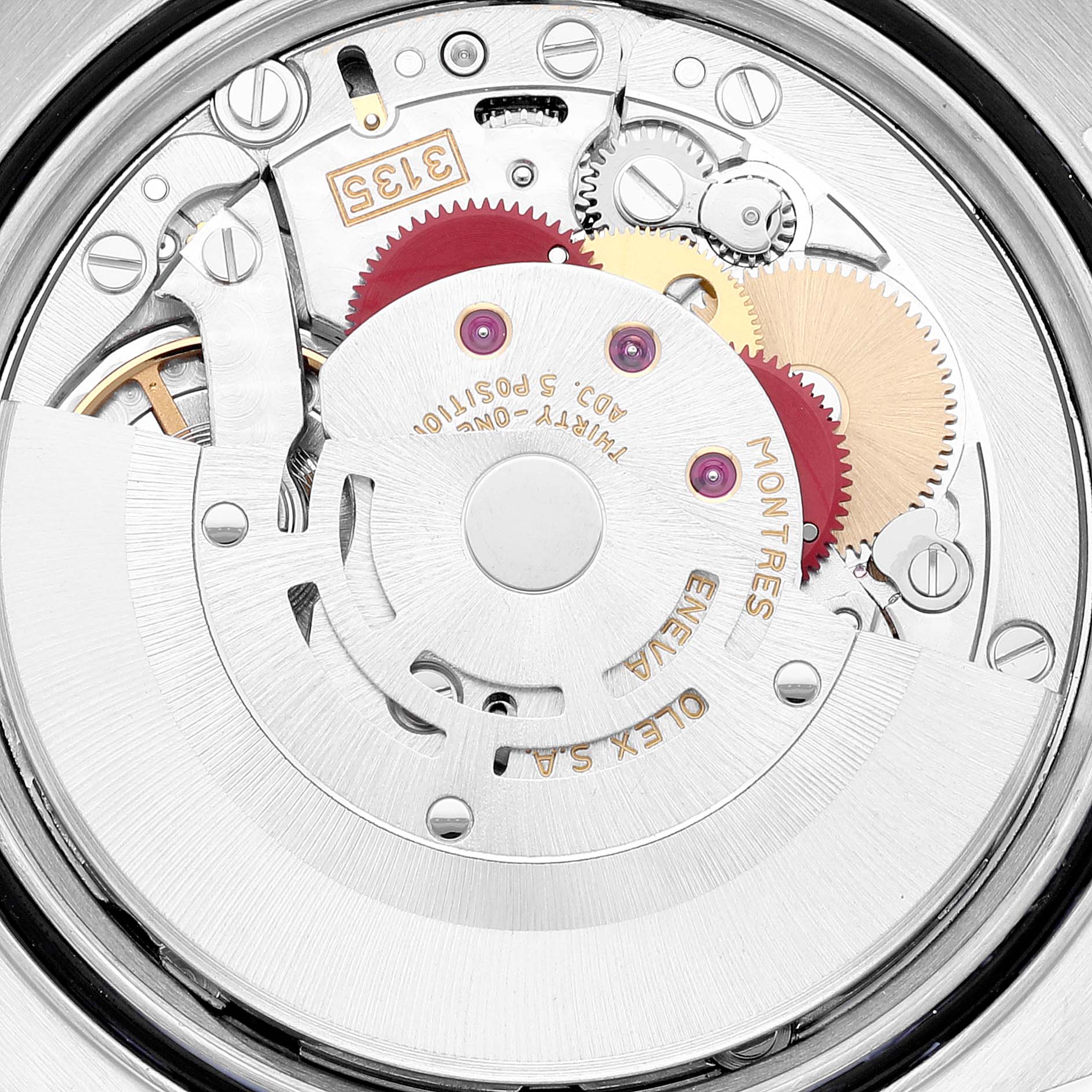 The image shows a close-up of the Rolex Datejust 16233 Men
s Steel and Gold (two tone) Champagne Dial 16233 Men
s Steel and Gold (two tone) Champagne Dial
s internal mechanism, highlighting gears and the rotor from a back angle.