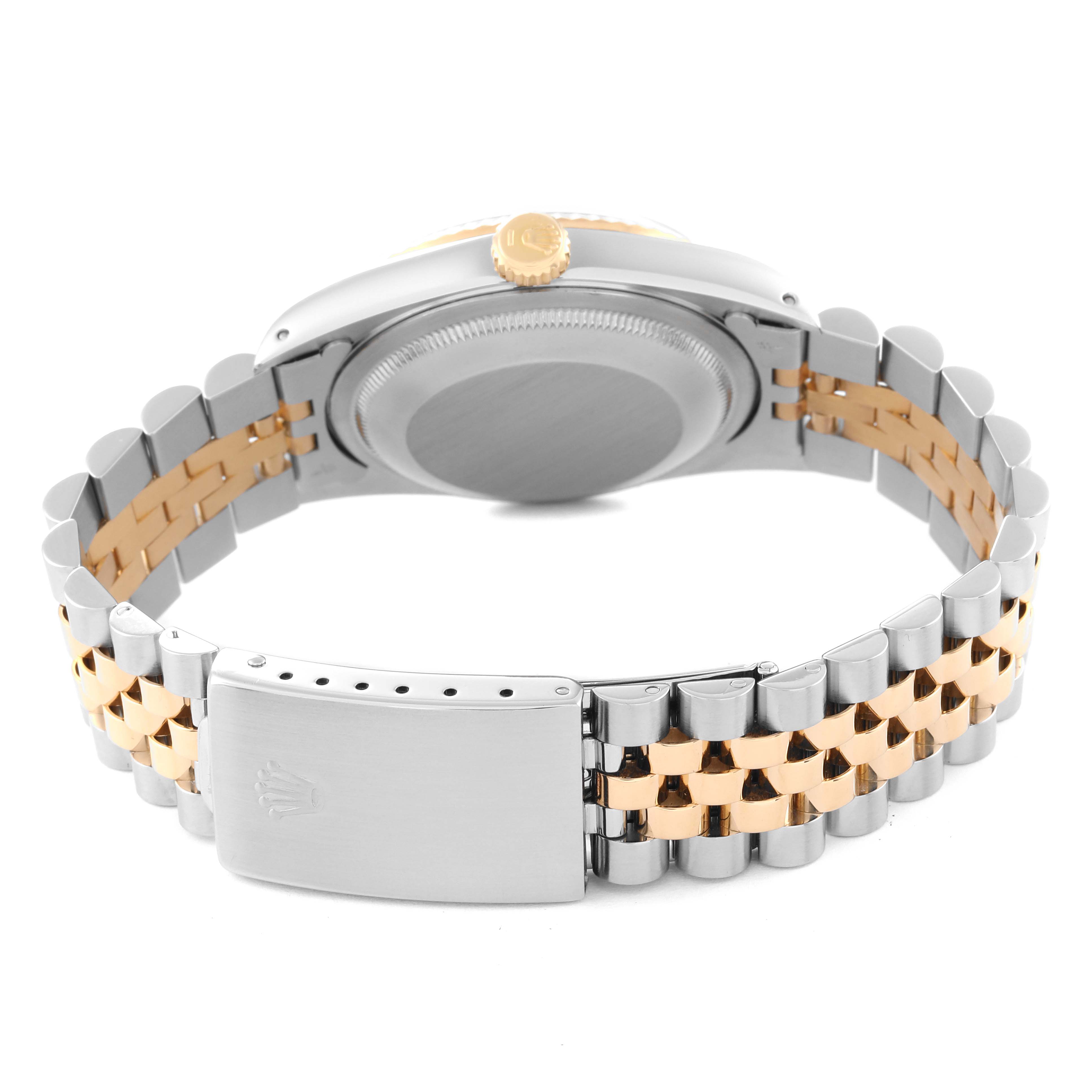 The image shows the Rolex Datejust 16233 Men
s Steel and Gold (two tone) Champagne Dial 16233 Men
s Steel and Gold (two tone) Champagne Dial
s bracelet and clasp from the back, highlighting the two-tone design and closed clasp.