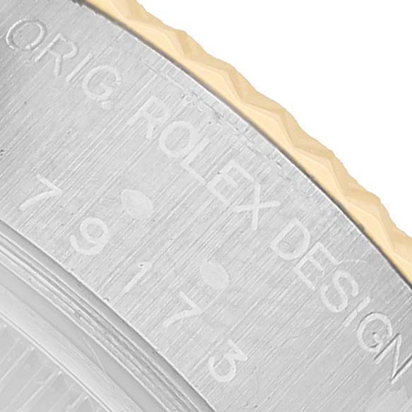 The image shows a close-up of the serial number on the case back edge of a Rolex Datejust 79173 Women's Steel and Gold (two tone) White Dial watch.