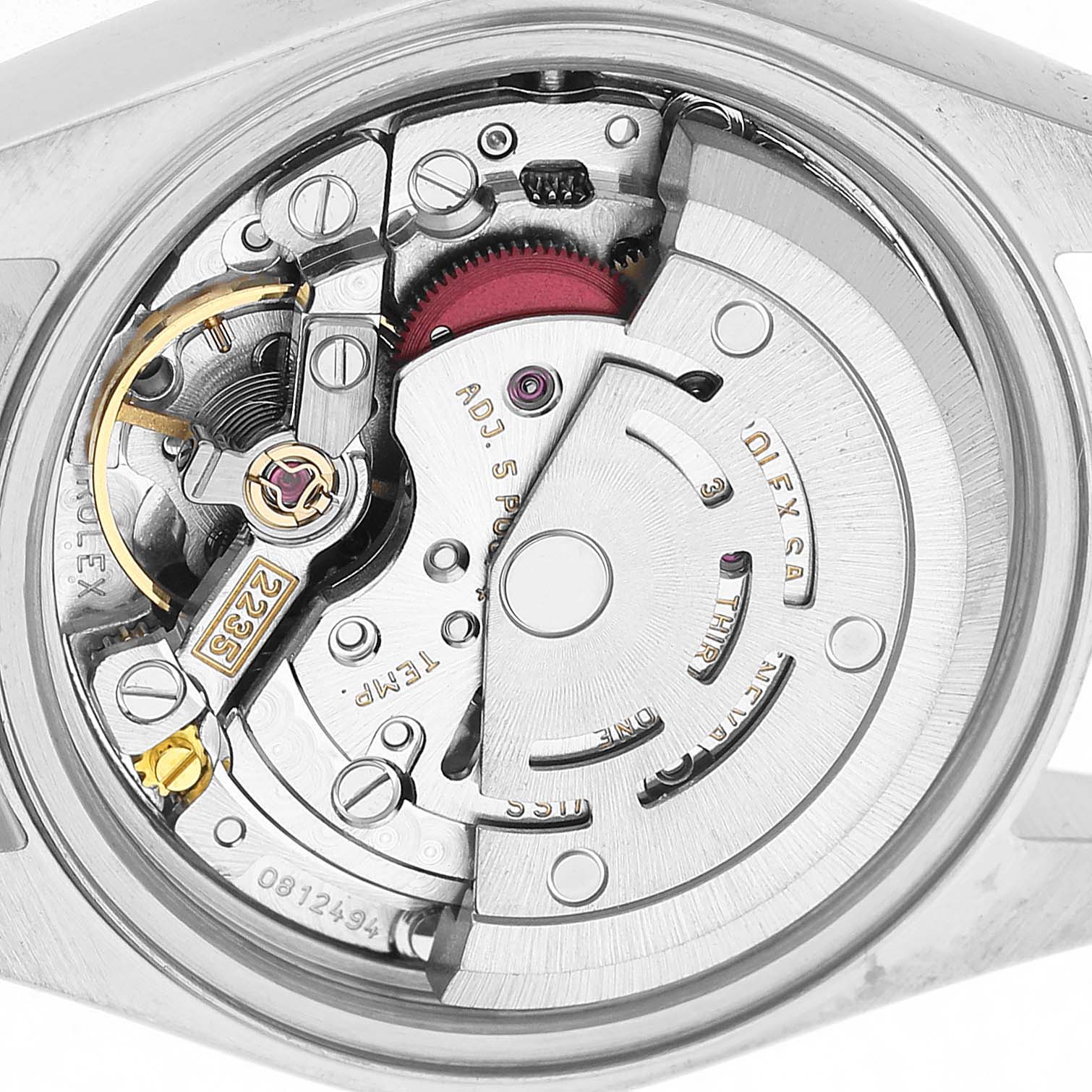 The image shows a close-up view of the Rolex Datejust 79173 Women's Steel and Gold (two tone) White Dial's movement from the back, highlighting its intricate mechanical parts.