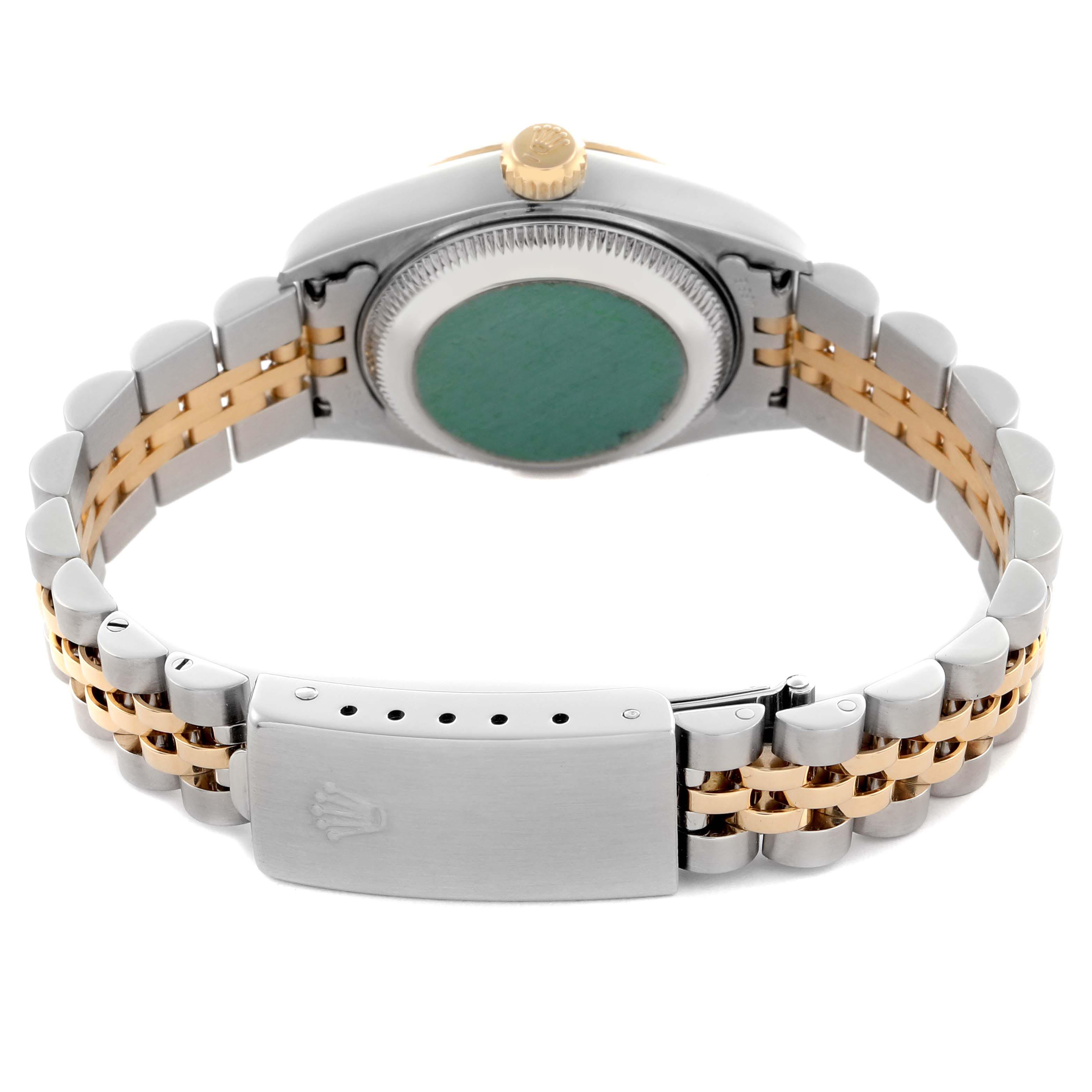 The image shows the back of a Rolex Datejust 79173 Women
s Steel and Gold (two tone) White Dial 79173 Women
s Steel and Gold (two tone) White Dial, highlighting the case back, crown, and two-tone Jubilee bracelet with clasp.