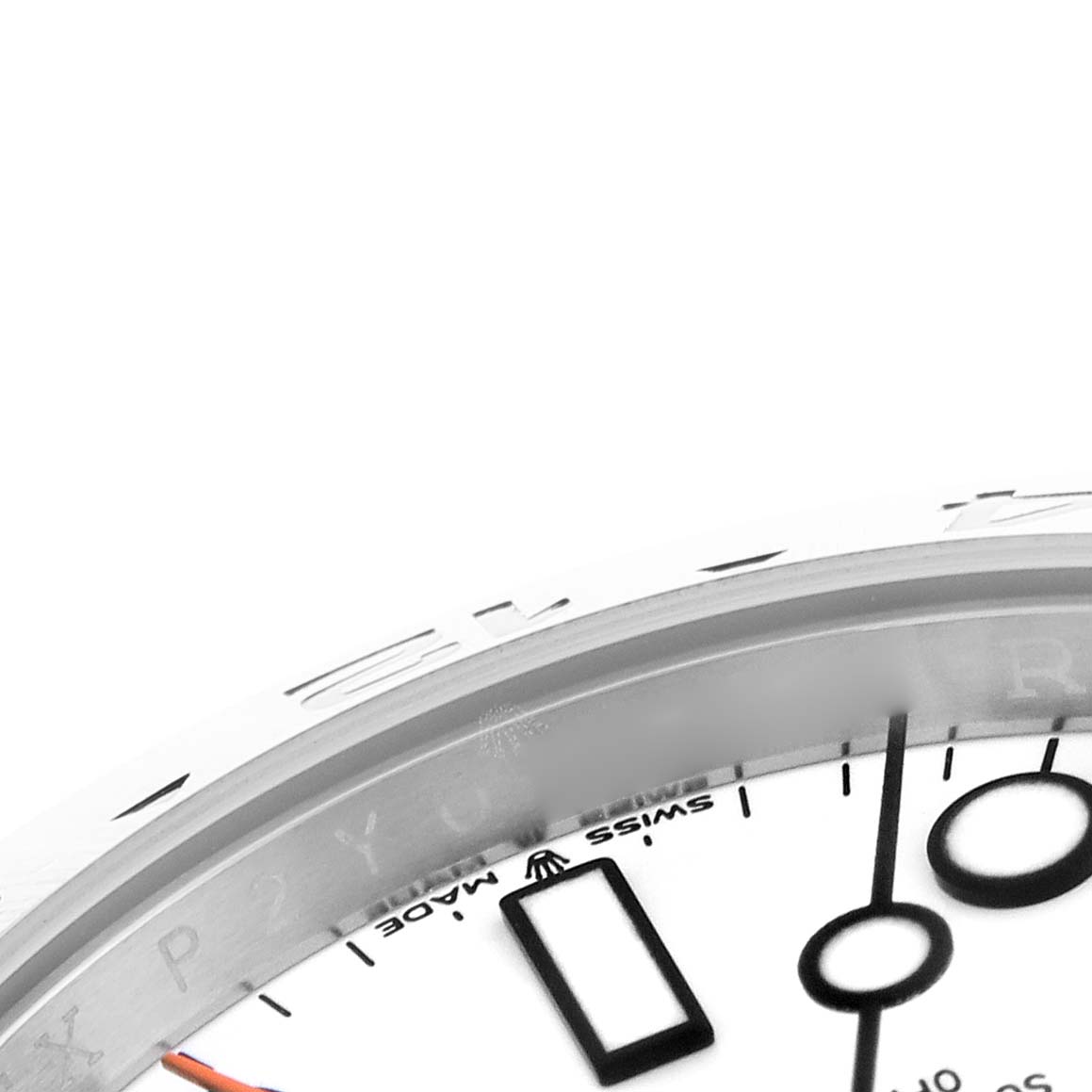 The image shows a close-up of the dial and bezel of a Rolex Explorer 226570 Men
s Stainless Steel White Dial 226570 Men
s Stainless Steel White Dial watch, focusing on the indices and part of the branding.