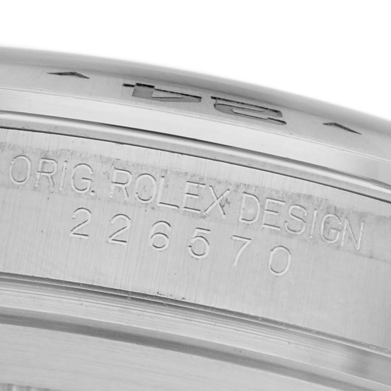 The image shows a detailed close-up of the side engraving on a Rolex Explorer 226570 Men
s Stainless Steel White Dial 226570 Men
s Stainless Steel White Dial, displaying the model number 226570.