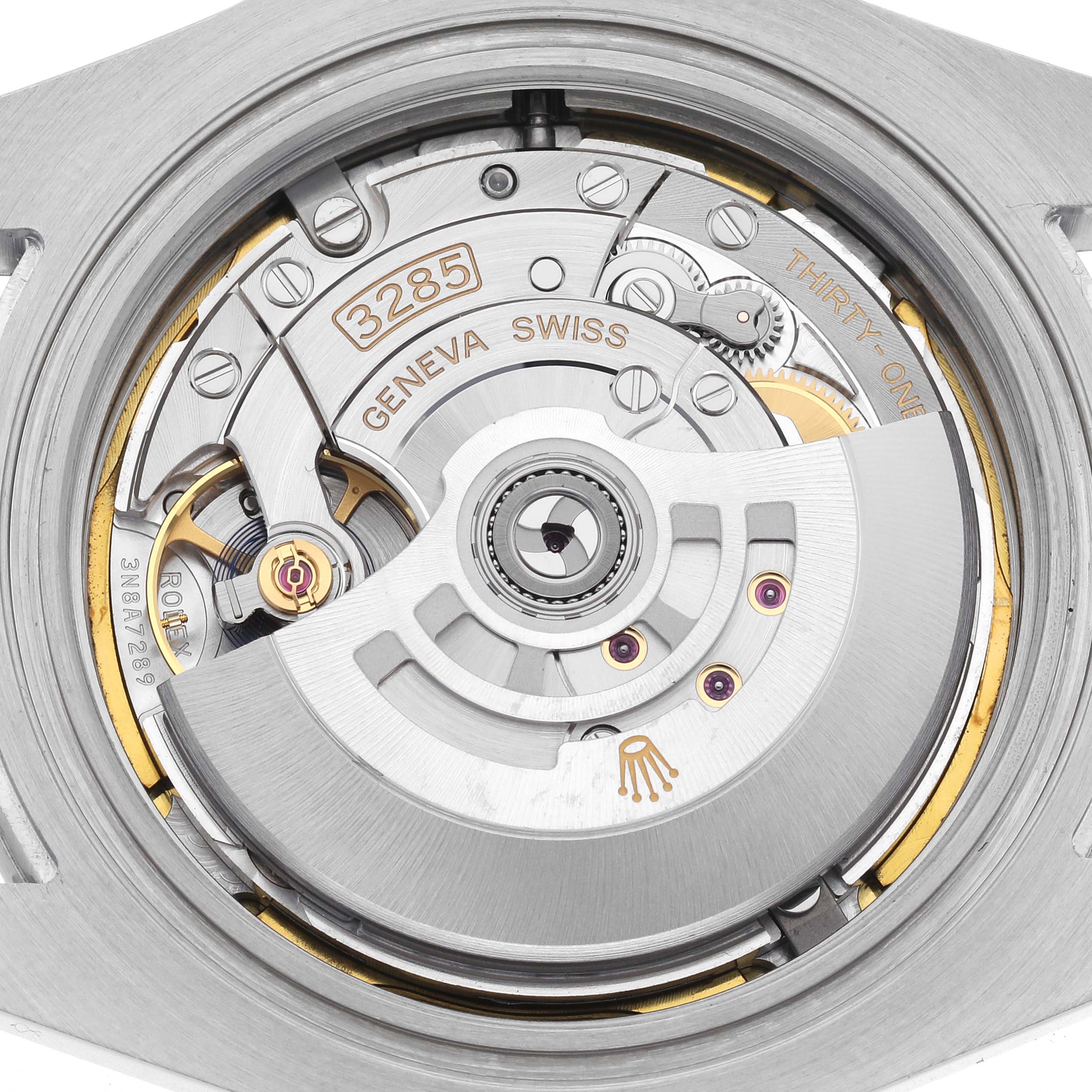 The image shows the Rolex Explorer 226570 Men
s Stainless Steel White Dial 226570 Men
s Stainless Steel White Dial watch
s movement from the back, highlighting its mechanism and rotor.