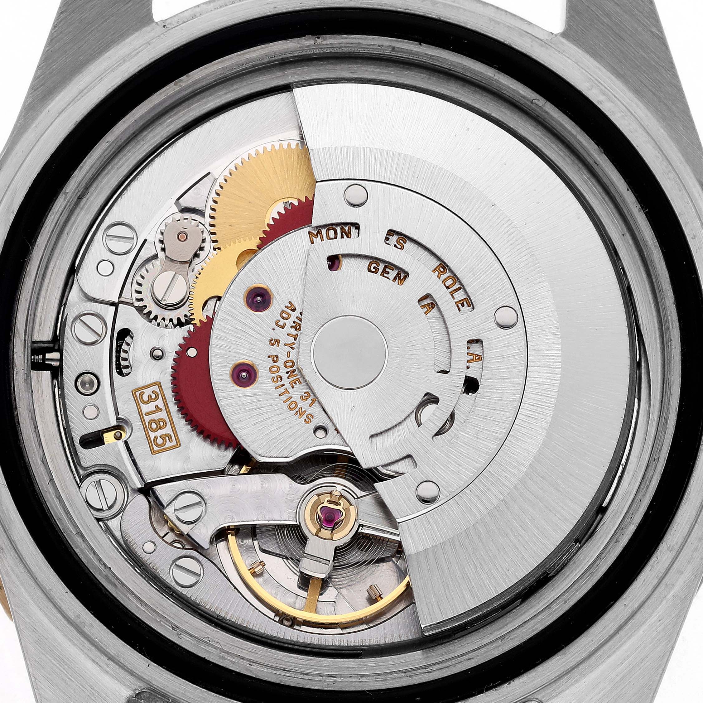 The image shows the back view of the Rolex GMT-Master 16713 Men
s Steel and Gold (two tone) Brown Dial 16713 Men
s Steel and Gold (two tone) Brown Dial, highlighting its intricate movement and internal components.