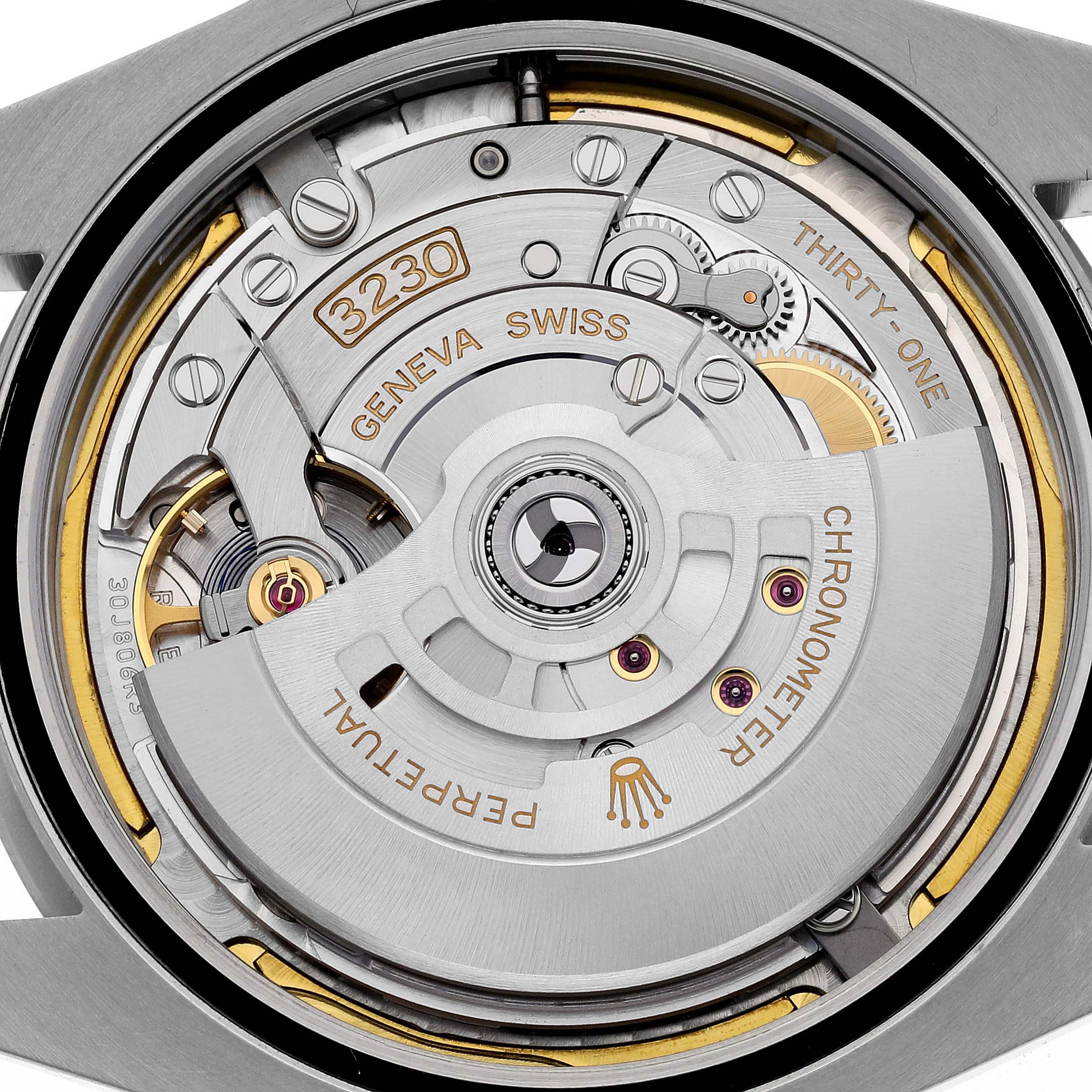 The image shows a close-up of the Rolex Air-King 126900 Men's Stainless Steel Black Dial 126900 Men's Stainless Steel Black Dial's movement, specifically the caliber 3230 mechanism from the back.