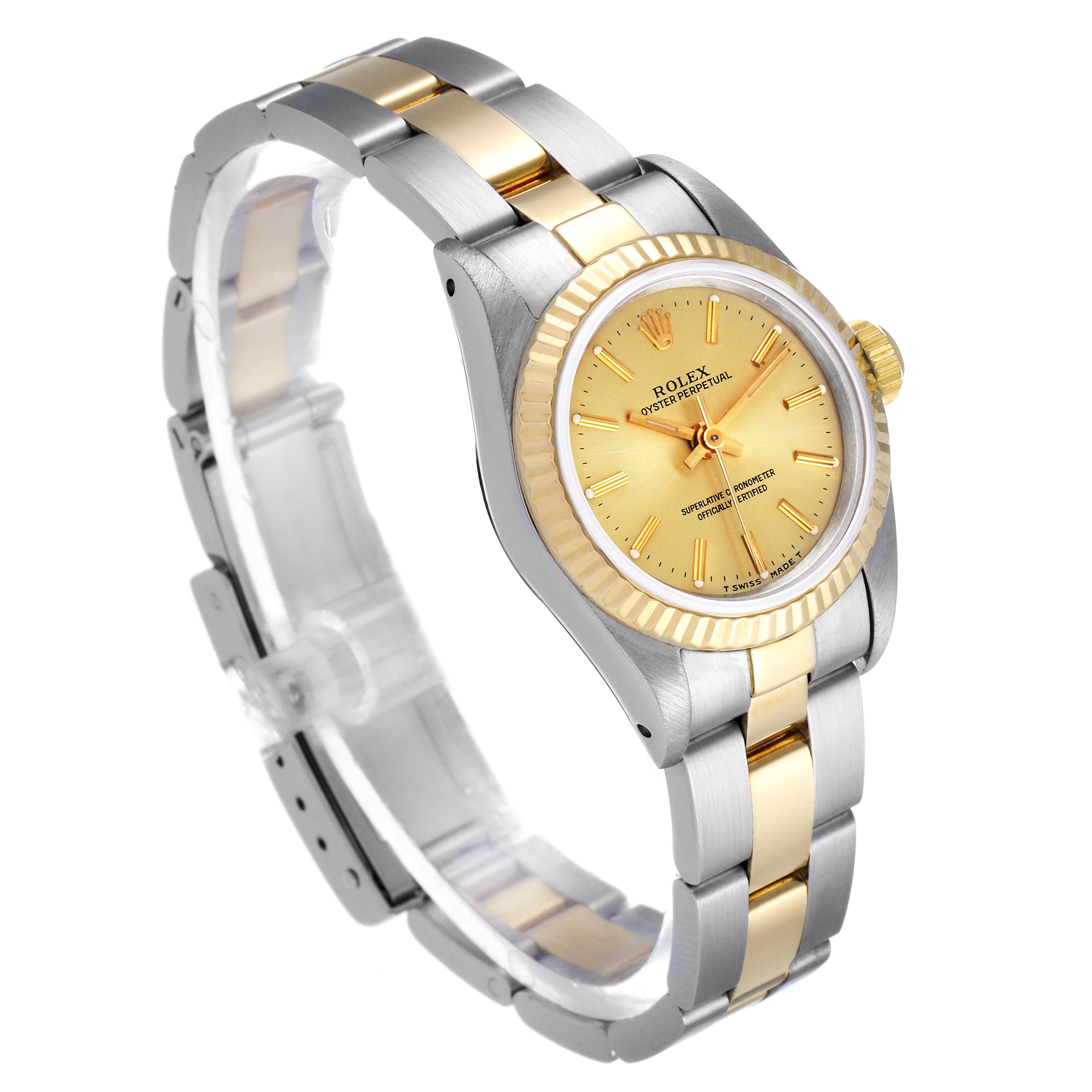 The image shows a Rolex Oyster Perpetual 67193 Women
s Steel and Gold (two tone) Champagne Dial 67193 Women
s Steel and Gold (two tone) Champagne Dial watch at a three-quarter angle, highlighting its two-tone bracelet and gold dial.