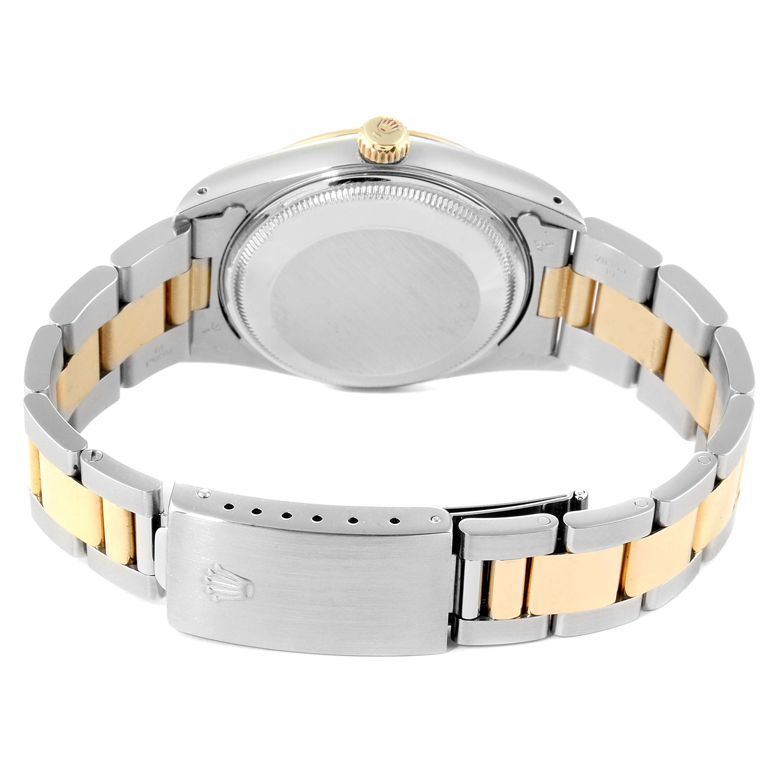 This image shows the back view of the Rolex Date 15223 Men's Steel and Gold (two tone) Blue Dial 15223 Men's Steel and Gold (two tone) Blue Dial model watch, highlighting its case back and two-tone bracelet clasp.