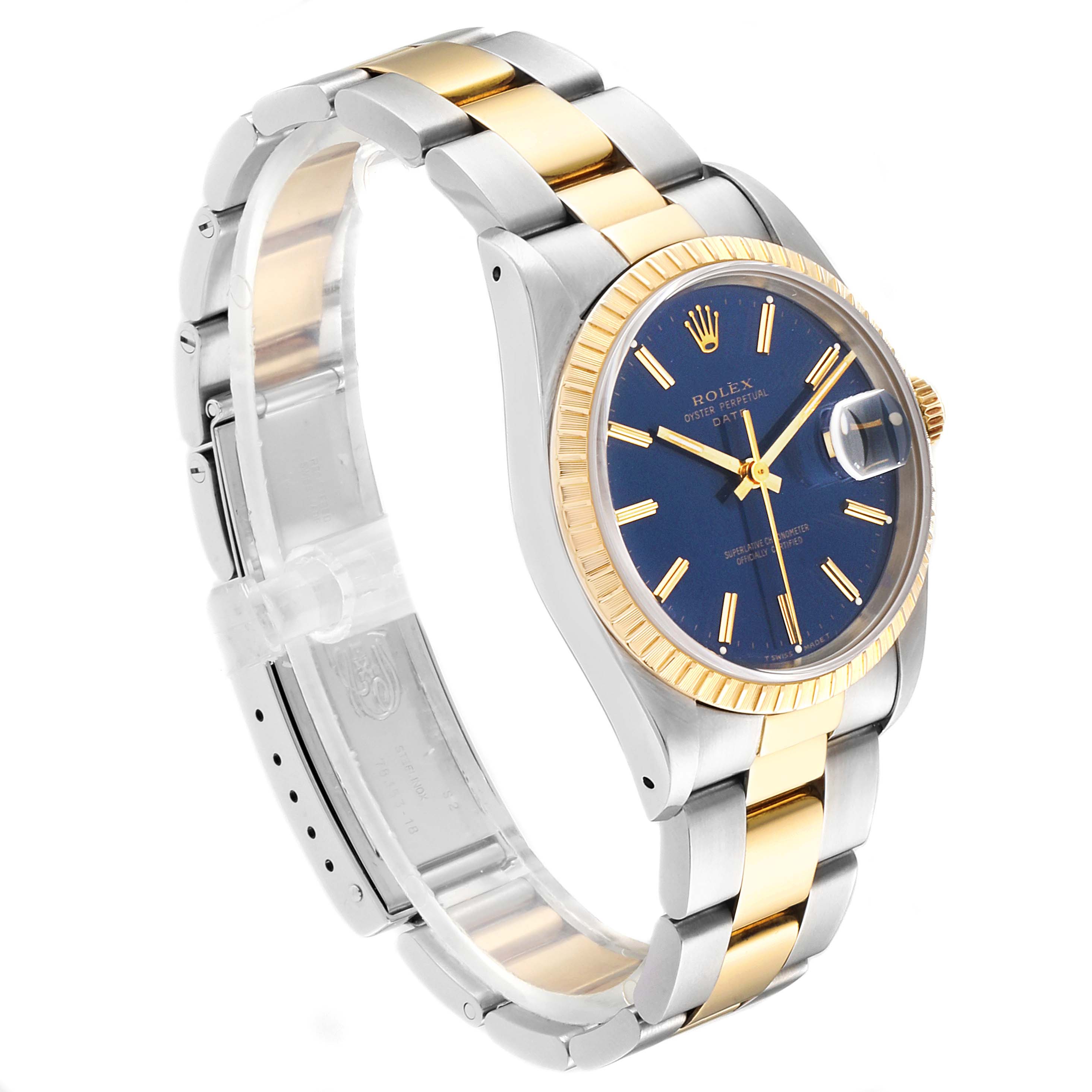 The image shows a Rolex Date 15223 Men's Steel and Gold (two tone) Blue Dial 15223 Men's Steel and Gold (two tone) Blue Dial model watch at a 3/4 angle, highlighting its two-tone band, blue dial, and fluted bezel.