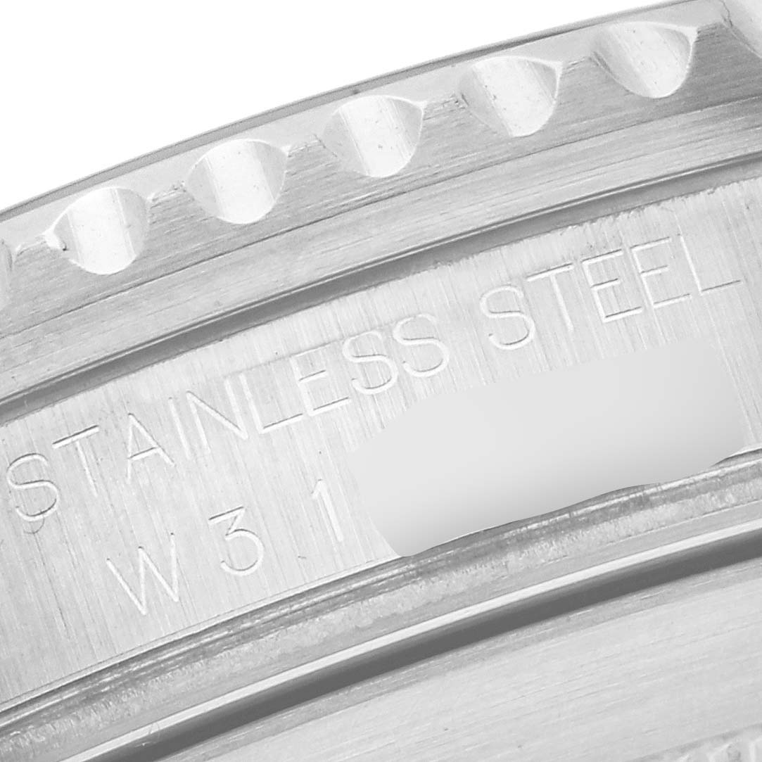 The close-up image shows the engraved stainless steel case back and part of the rotating bezel of a Rolex Submariner 16610 Men
s Stainless Steel Black Dial 16610 Men
s Stainless Steel Black Dial watch.