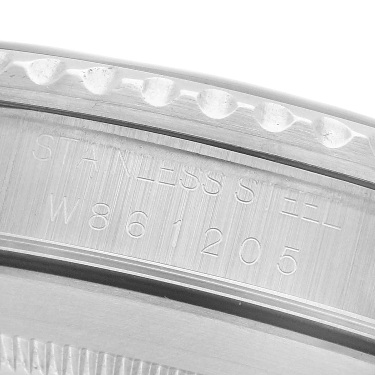 The image shows a close-up of the stainless steel case back with engravings on the Rolex Submariner 14060 Men
s Stainless Steel Black Dial 14060 Men
s Stainless Steel Black Dial.