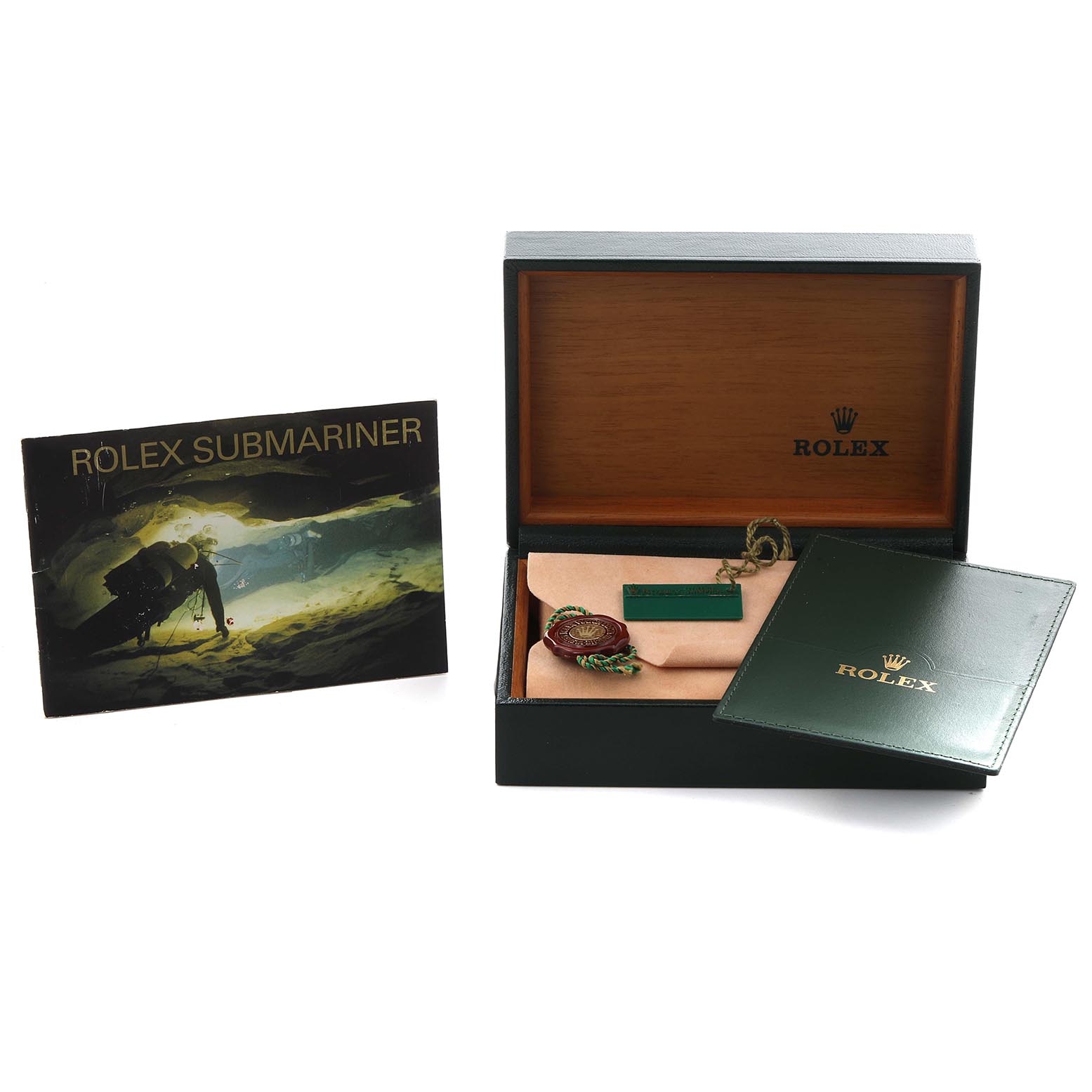 The image shows a Rolex Submariner 14060 Men
s Stainless Steel Black Dial 14060 Men
s Stainless Steel Black Dial box at an angle, displaying its interior, along with a booklet and a cardholder.