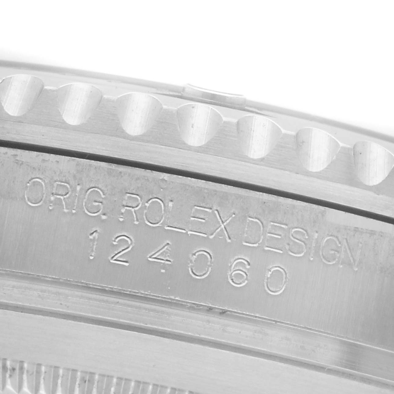 The image shows a close-up of the Rolex Submariner 124060 Men
s Stainless Steel Black Dial 124060 Men
s Stainless Steel Black Dial
s bezel and engraving, highlighting its design and model number.