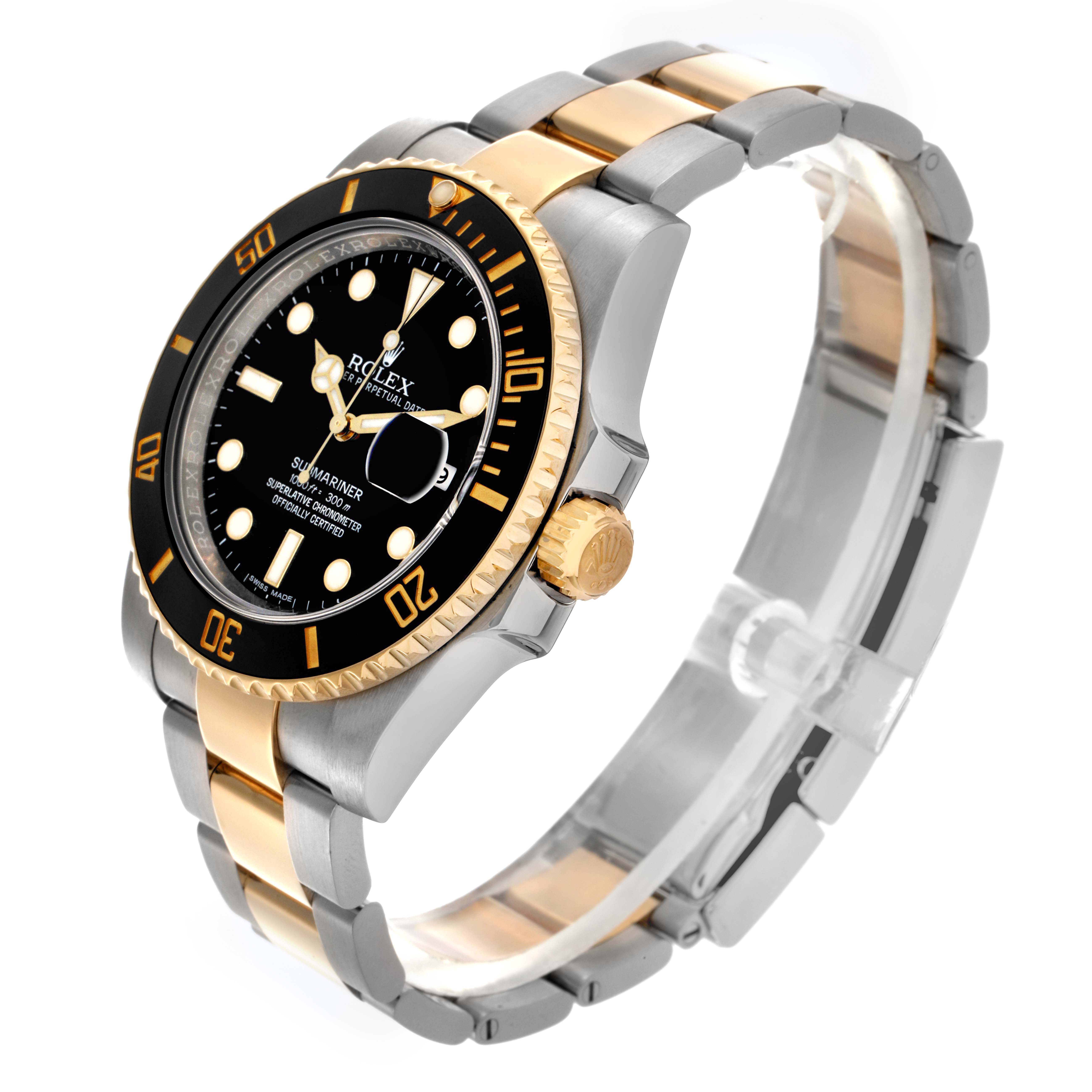 The Rolex Submariner 116613 Men
s Steel and Gold (two tone) Black Dial 116613 Men
s Steel and Gold (two tone) Black Dial watch is shown at a tilted angle, highlighting the bezel, crown, and two-tone bracelet.