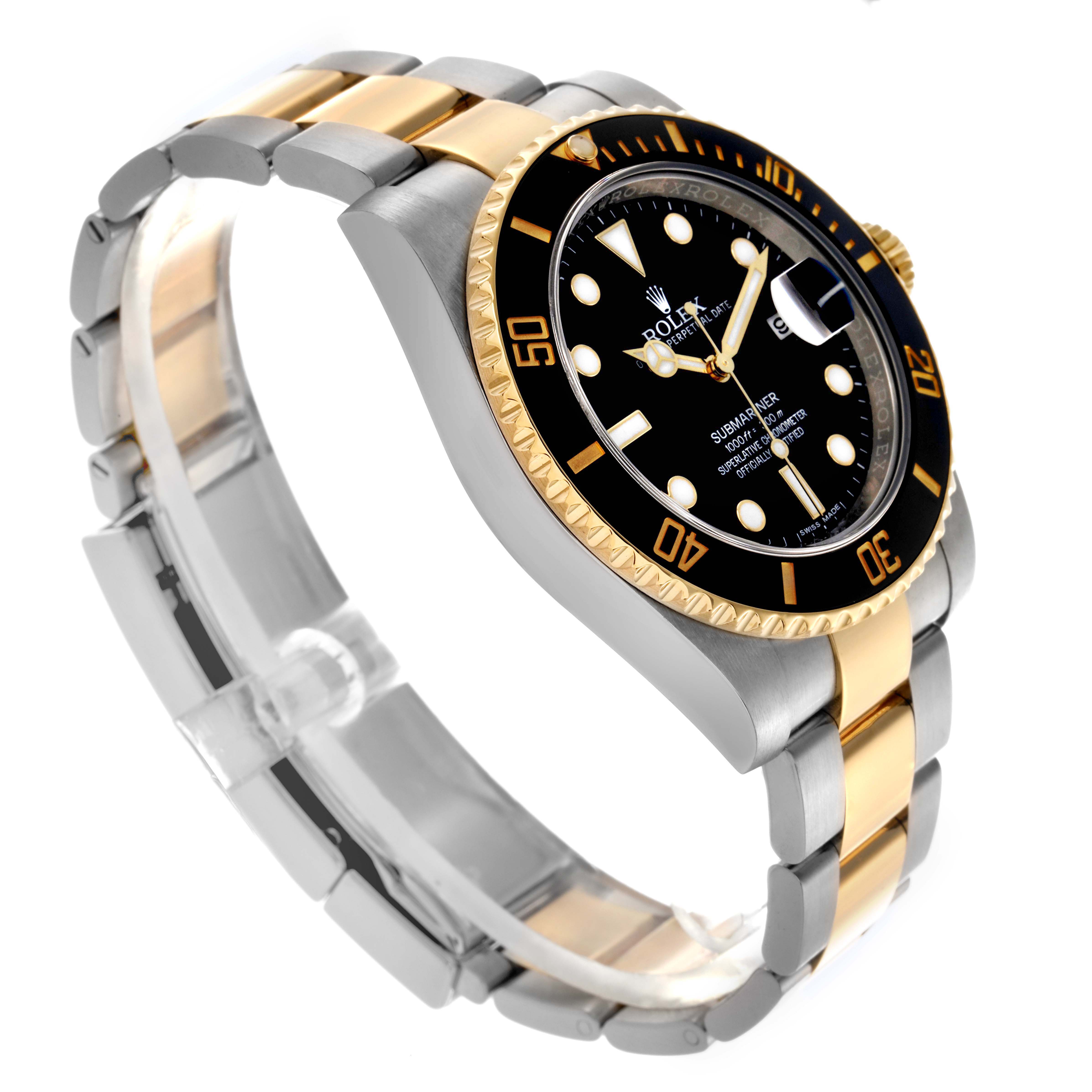 The Rolex Submariner 116613 Men
s Steel and Gold (two tone) Black Dial 116613 Men
s Steel and Gold (two tone) Black Dial is shown at a three-quarter angle, highlighting the dial, bezel, and two-tone bracelet.