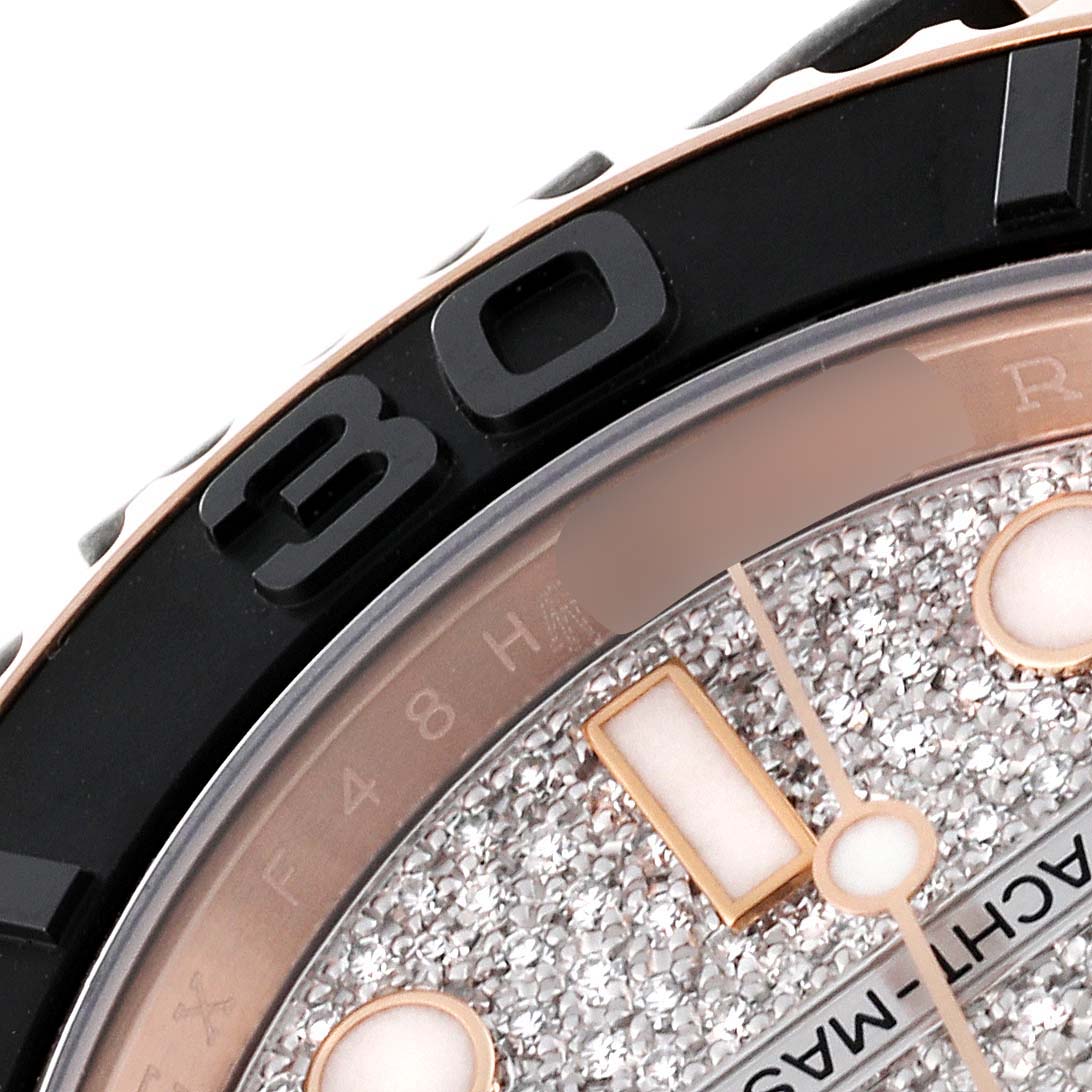 The image shows a close-up of the Rolex Yacht-Master 116655 Men's Rose Gold Silver Dial 116655 Men's Rose Gold Silver Dial watch, focusing on part of the bezel and the detailed dial.