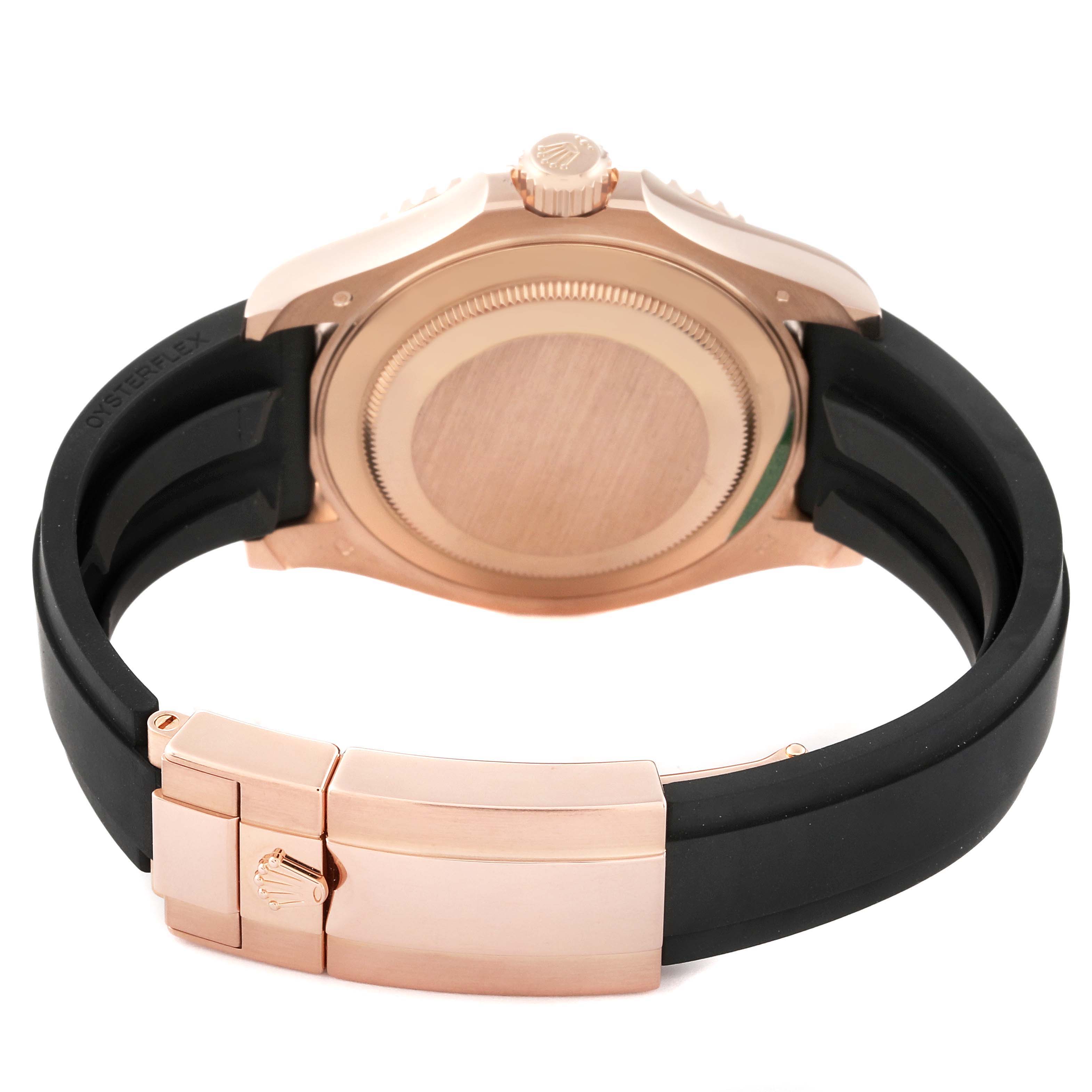 The image shows the back view of a Rolex Yacht-Master 116655 Men's Rose Gold Silver Dial 116655 Men's Rose Gold Silver Dial watch, focusing on the case back and clasp with a black strap.