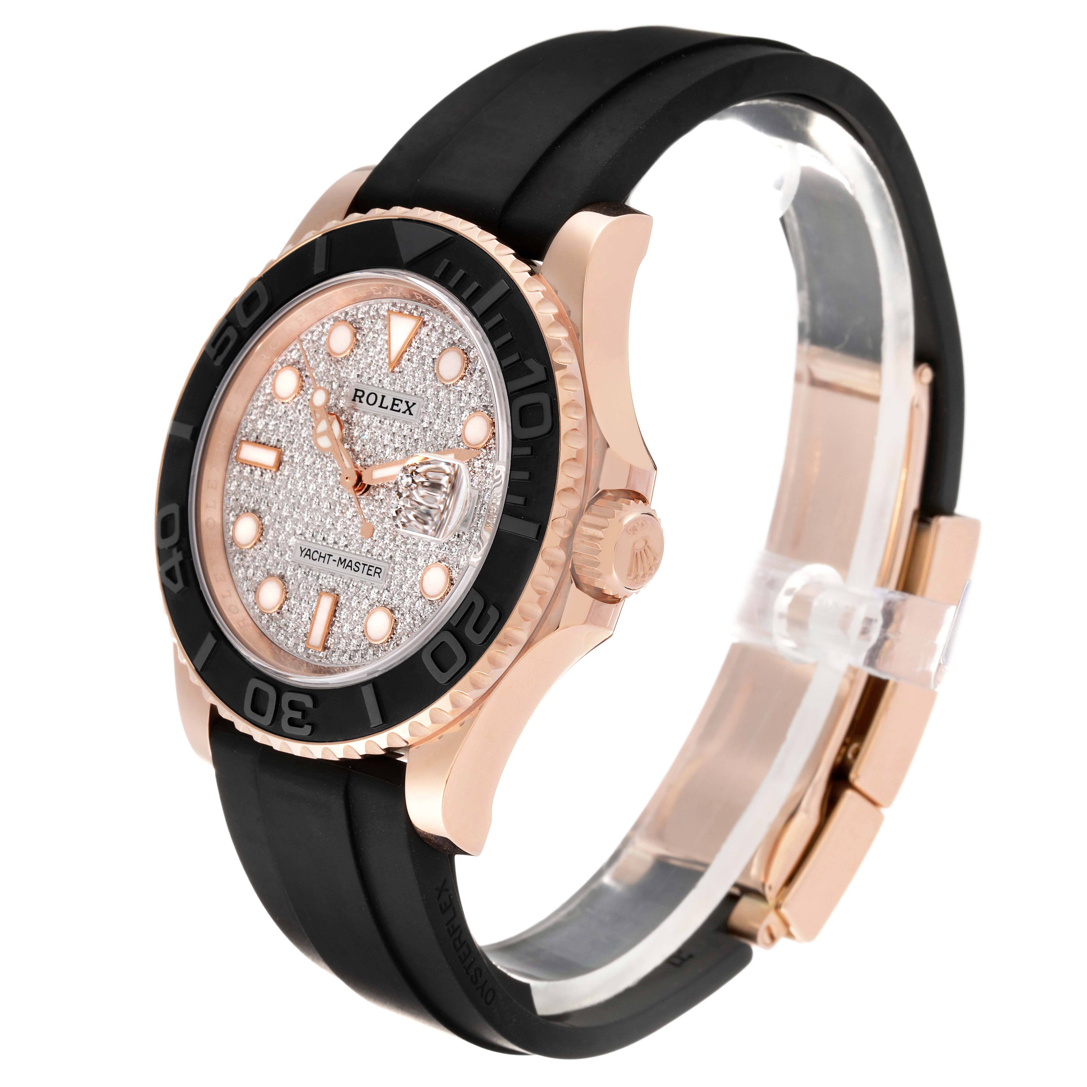 The Rolex Yacht-Master 116655 Men's Rose Gold Silver Dial watch is shown from a three-quarter angle, highlighting the face, bezel, crown, and part of the strap.