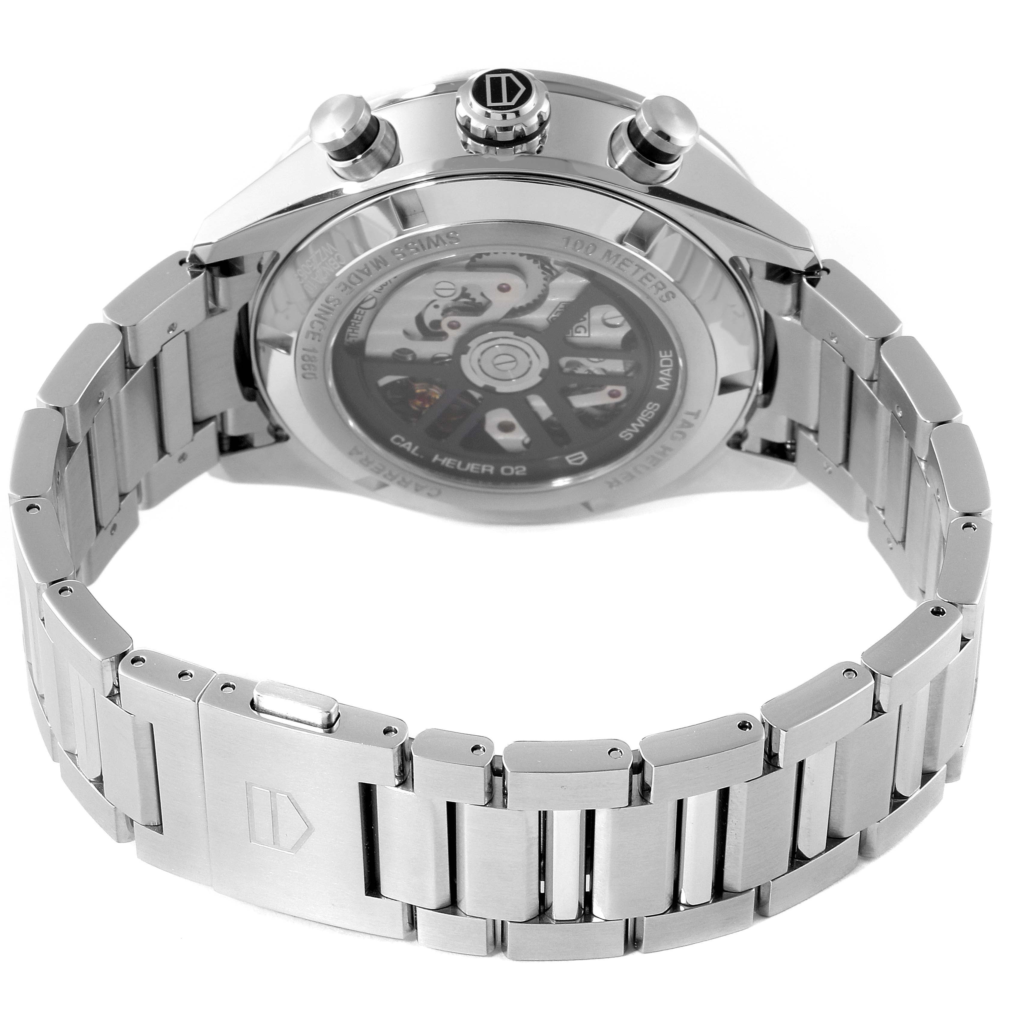 The image shows the back and bracelet of a Tag Heuer Carrera CBN2A10.BA0643 Men
s Stainless Steel Green Dial CBN2A10.BA0643 Men
s Stainless Steel Green Dial watch, highlighting its stainless steel construction and transparent case back.