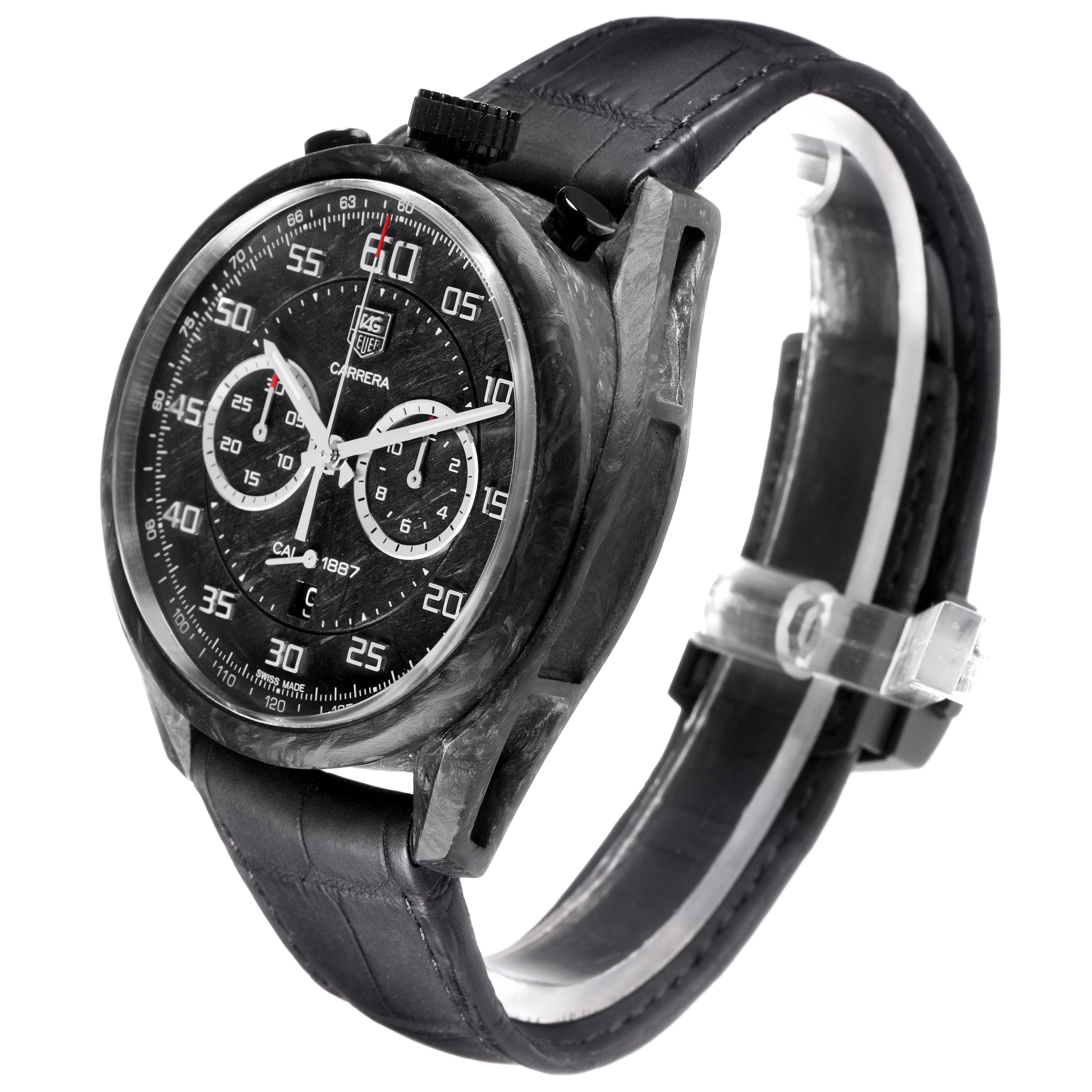 The image shows the Tag Heuer Carrera model CAR2C90.FC6341 at a three-quarter angle, highlighting the black dial, chronograph subdials, and dark strap.