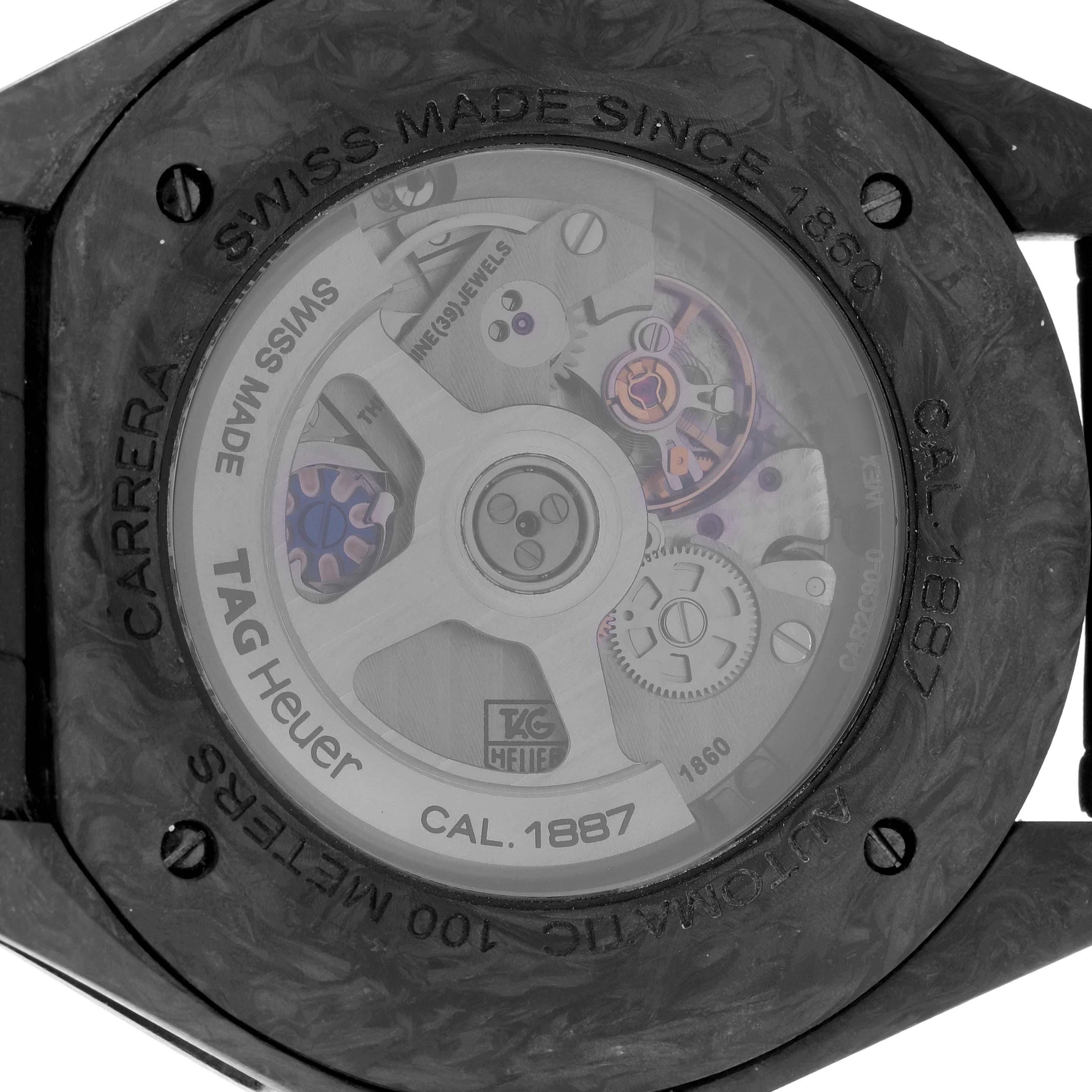 The image shows the back of the TAG Heuer Carrera model CAR2C90.FC6341, highlighting the exposed automatic movement and Calibre 1887 inscriptions.