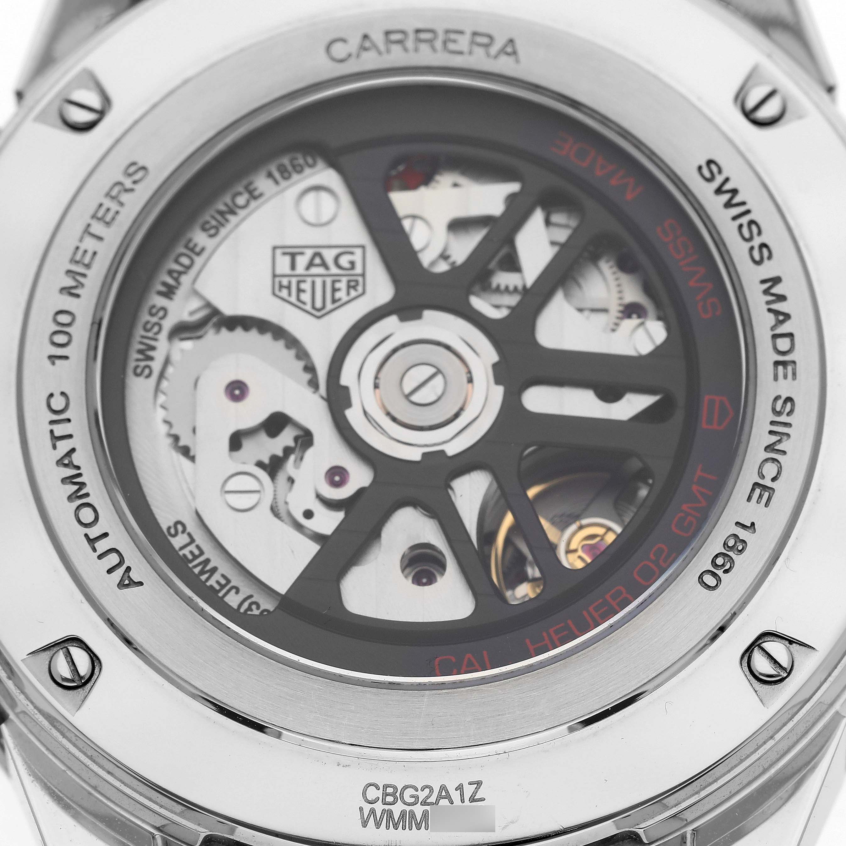 The image shows the back case of the Tag Heuer Carrera CBG2A1Z Men's Stainless Steel Black Dial CBG2A1Z Men's Stainless Steel Black Dial watch, revealing the internal gears and mechanical parts.