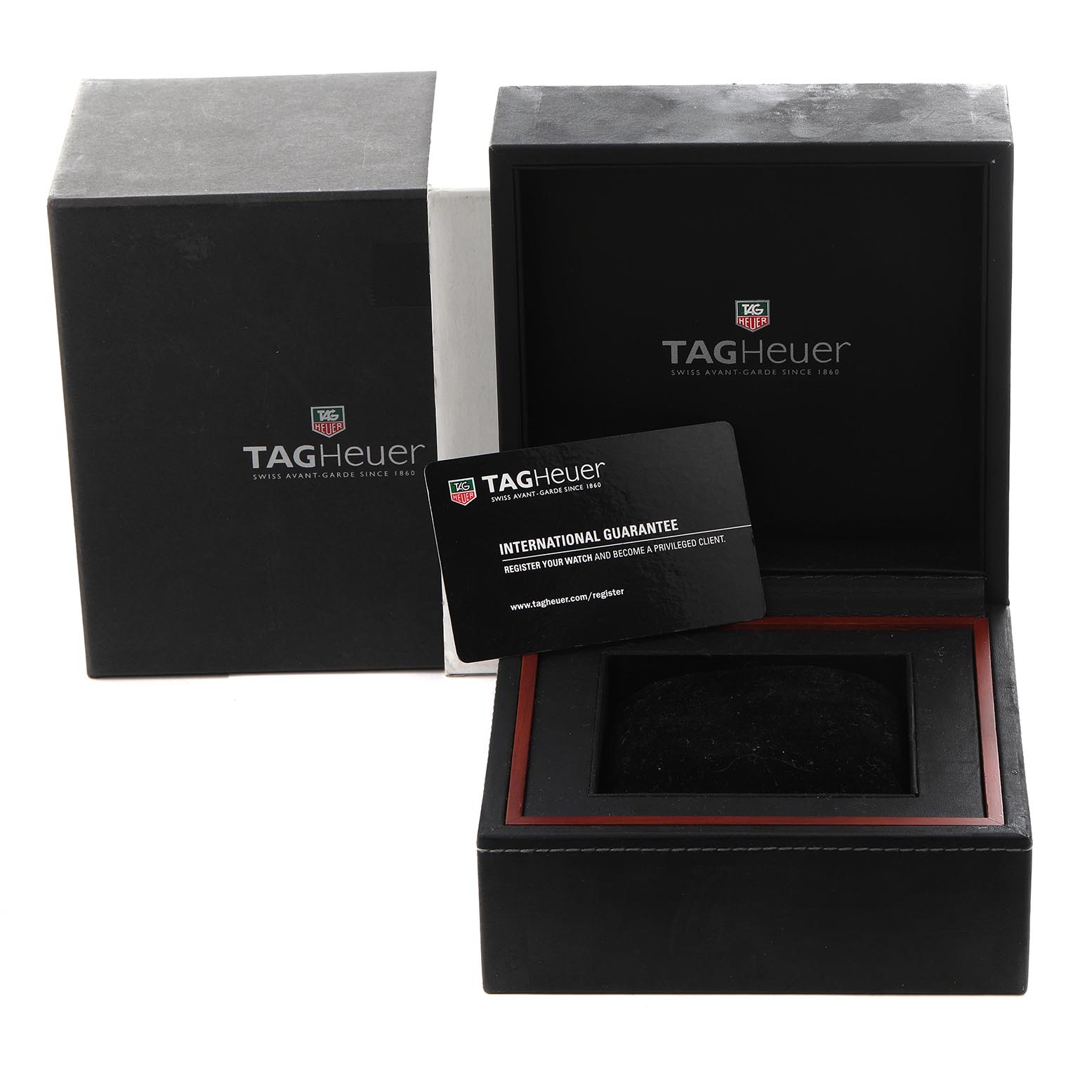 The image shows a Tag Heuer Carrera CAS2111 BA0730 Men
s Stainless Steel Silver Dial CAS2111 BA0730 Men
s Stainless Steel Silver Dial watch box with the lid open, alongside an international guarantee card.