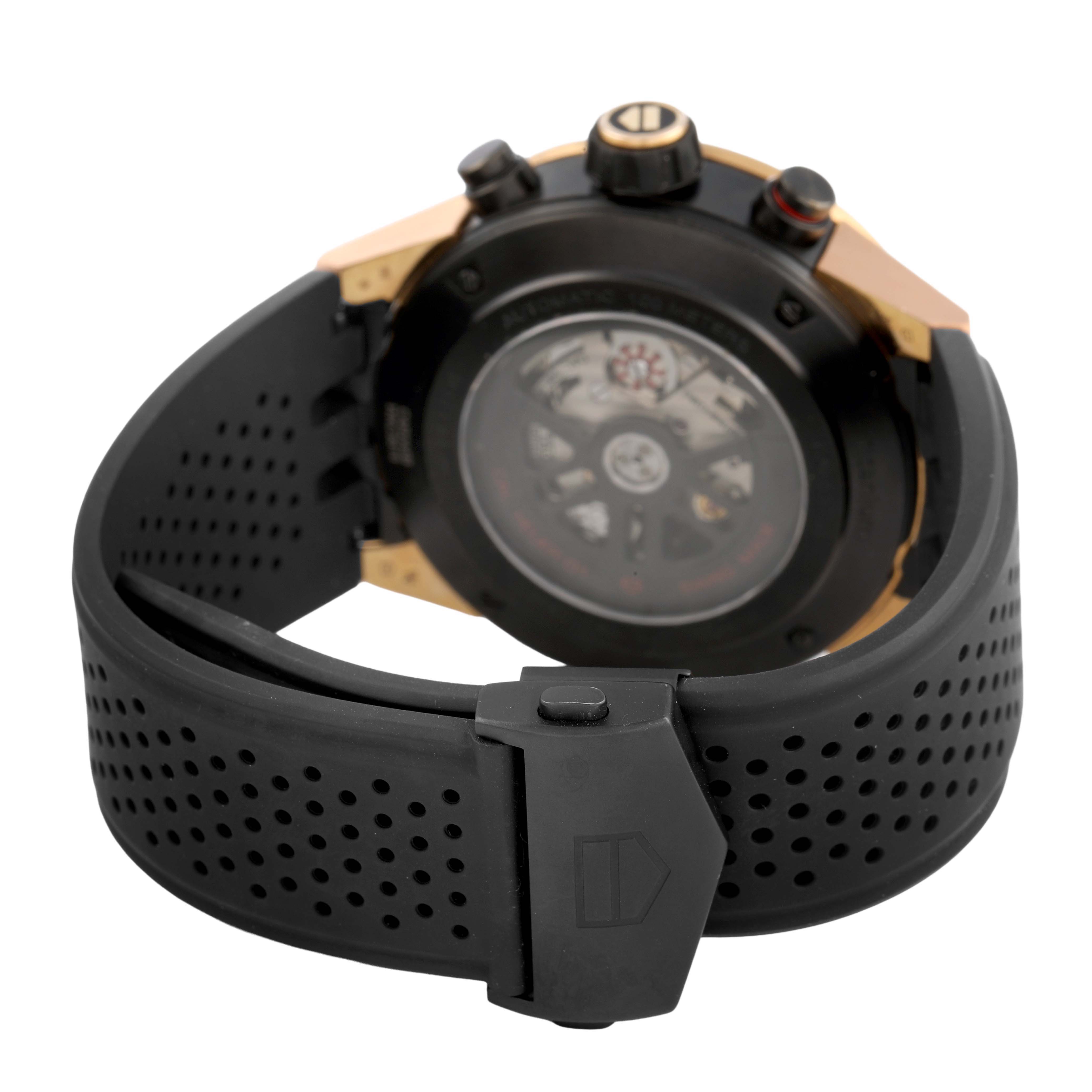 The image shows the back case and strap of the Tag Heuer Carrera CAR2A5B.FT6044 Men's Rose Gold Black Dial watch at an angle highlighting the clasp and movement.