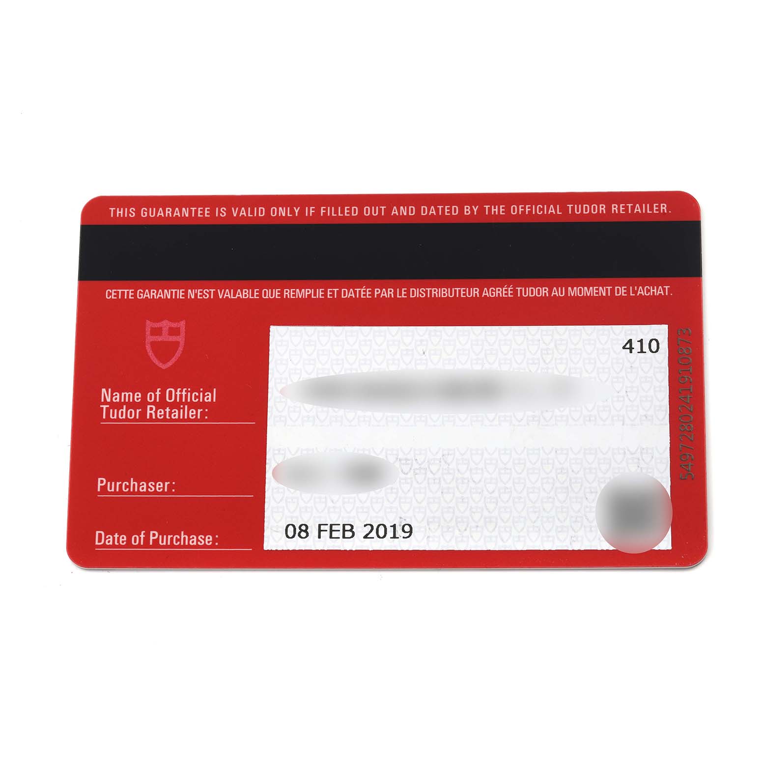 The image shows a Tudor Heritage Black Bay 79830RB Men
s Stainless Steel Black Dial 79830RB Men
s Stainless Steel Black Dial warranty card with purchase details.