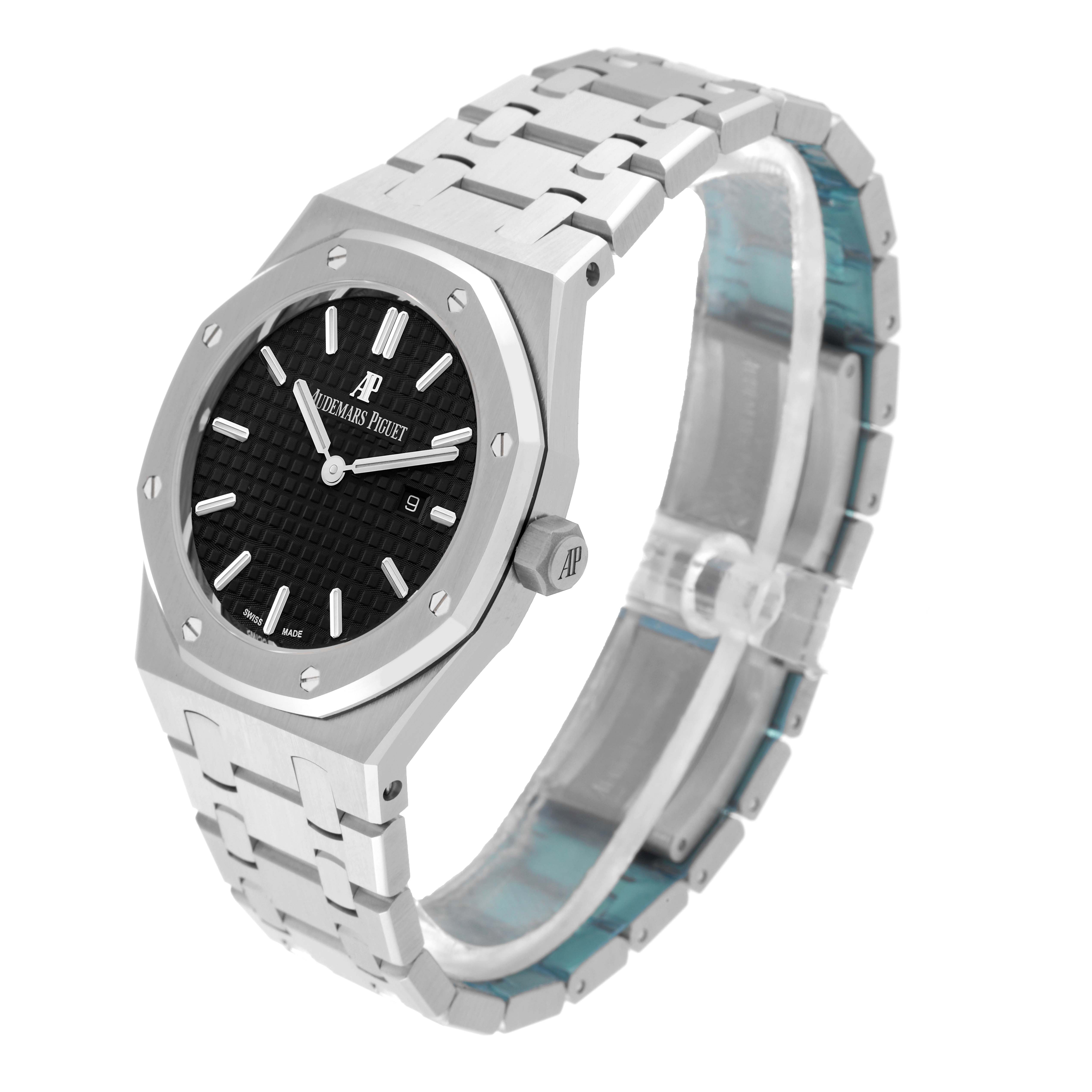 The image shows a side angle of the Audemars Piguet Royal Oak 67650ST.OO.1261ST.01 Women's Stainless Steel Black Dial 67650ST.OO.1261ST.01 Women's Stainless Steel Black Dial watch, highlighting its bracelet, black dial, and octagonal bezel.