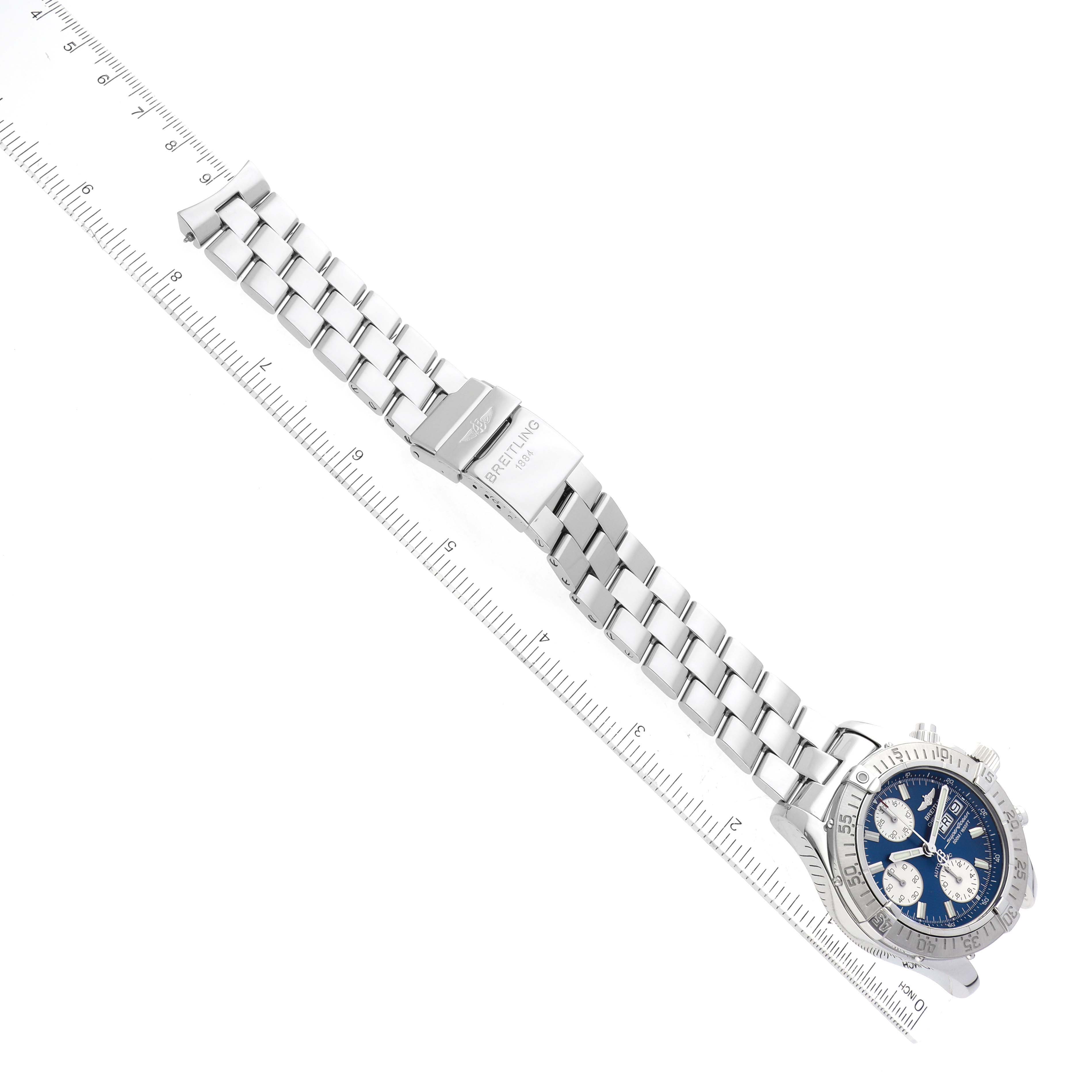 This image shows a top-down view of a Breitling Superocean A111C16PRS Men's Stainless Steel Blue Dial A111C16PRS Men's Stainless Steel Blue Dial watch fully extended with both the face and metal bracelet in view.