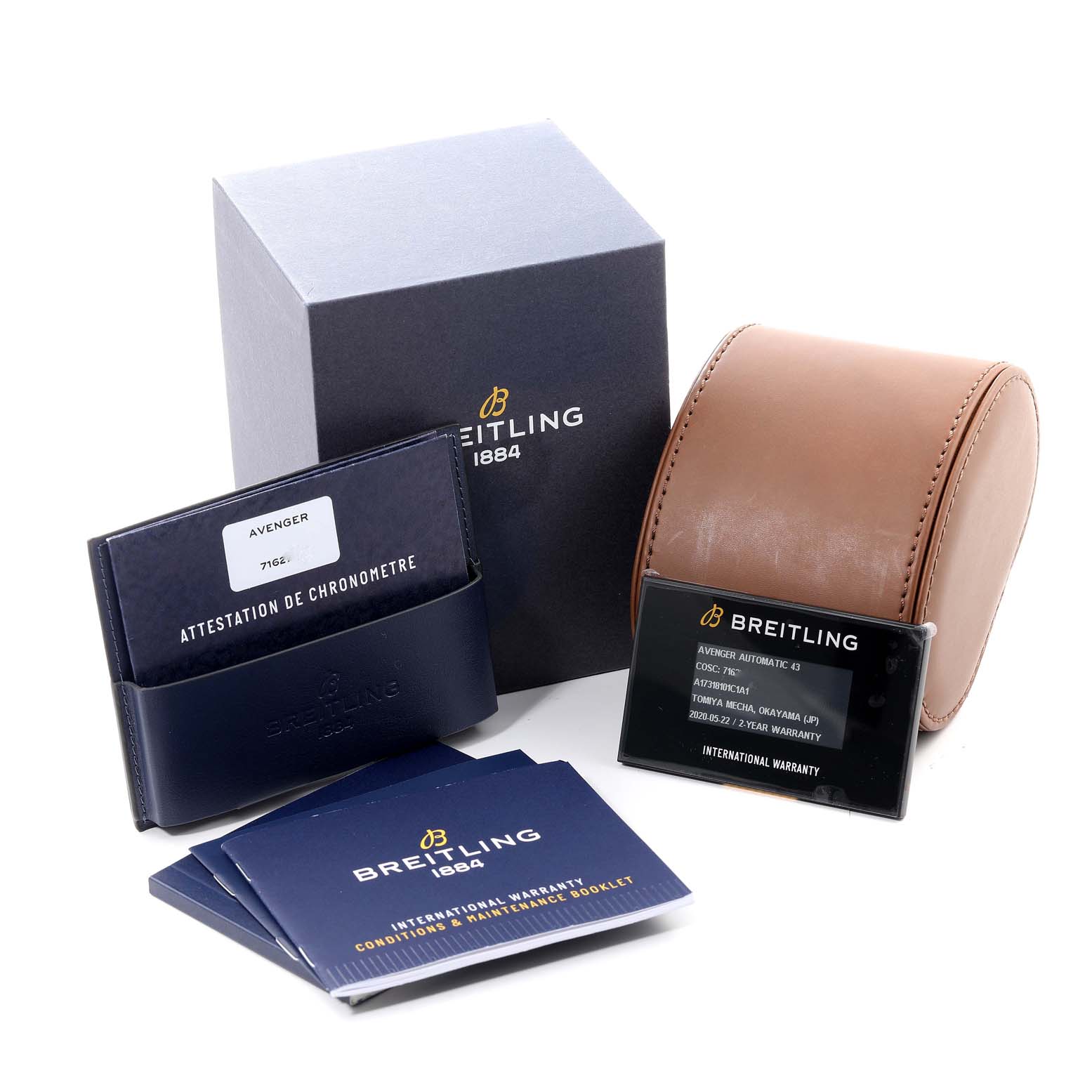 The image shows the Breitling Avenger A17318 Men's Stainless Steel Blue Dial A17318 Men's Stainless Steel Blue Dial watch accessories, including the box, warranty card, and leather case, from a frontal angle.