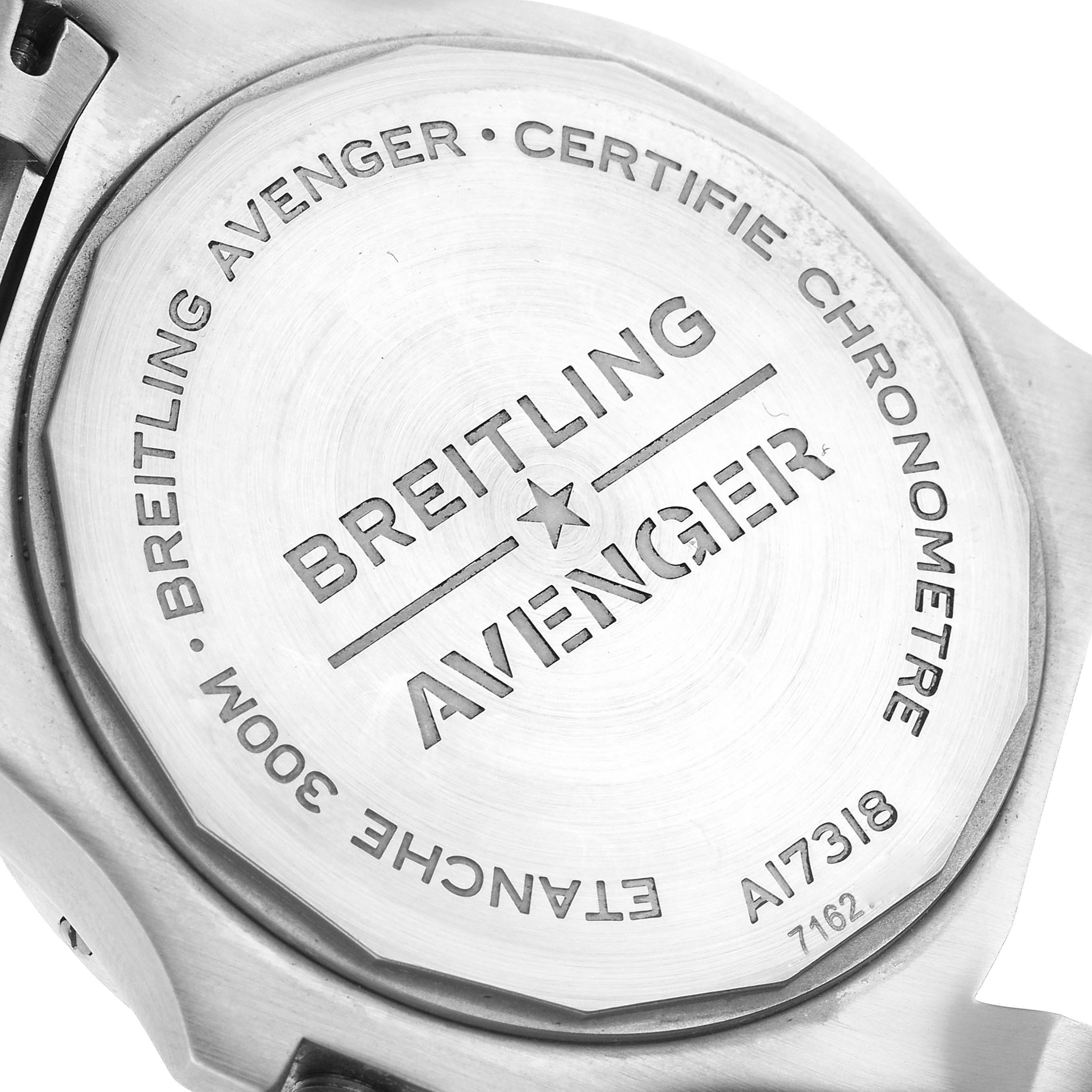 The image shows the case back of a Breitling Avenger A17318 Men's Stainless Steel Blue Dial A17318 Men's Stainless Steel Blue Dial watch, emphasizing its engravings and model details.