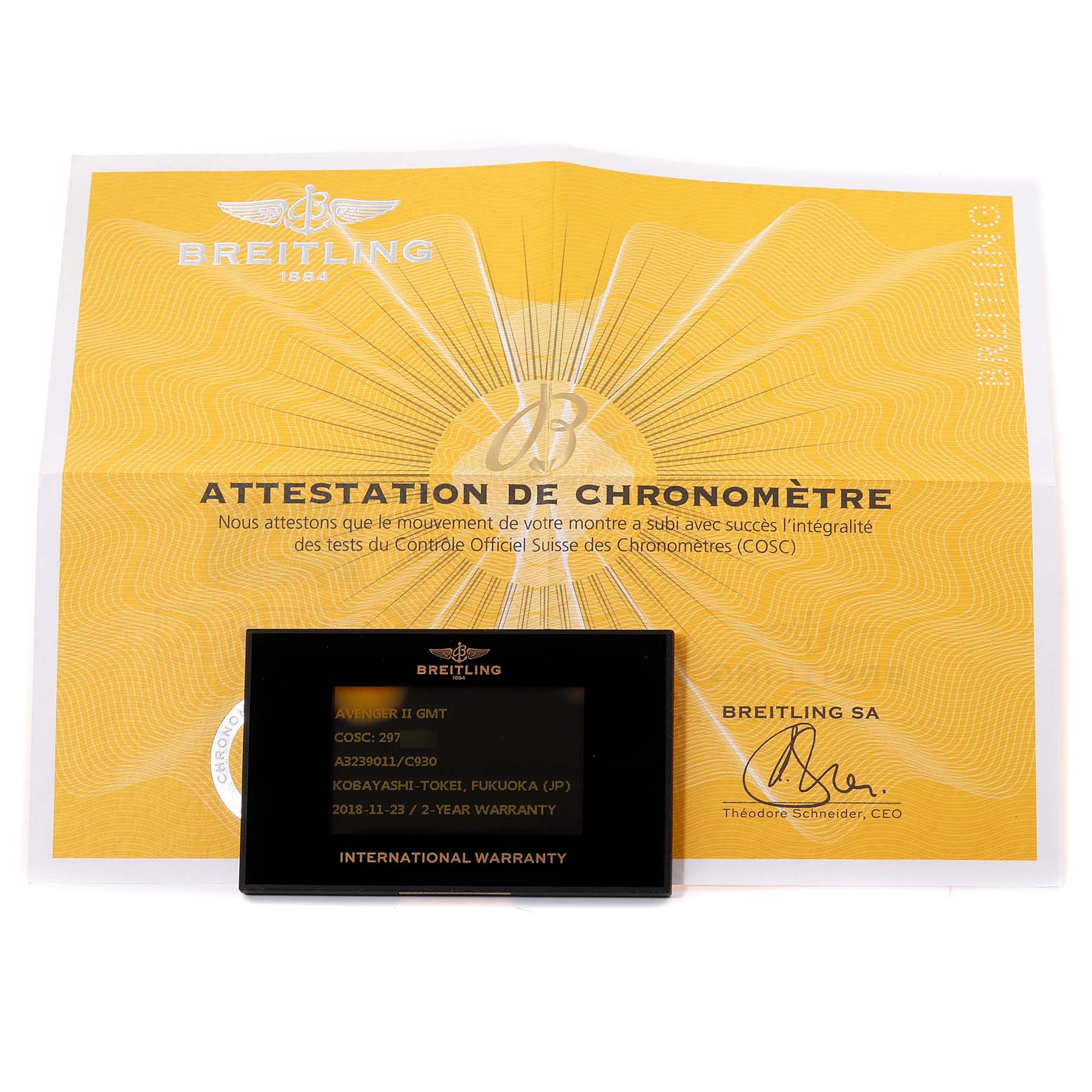 The image shows the certification and international warranty card for the Breitling Avenger A3239011/C930 Men's Stainless Steel Mother of Pearl Dial A3239011/C930 Men's Stainless Steel Mother of Pearl Dial II GMT watch laid flat.