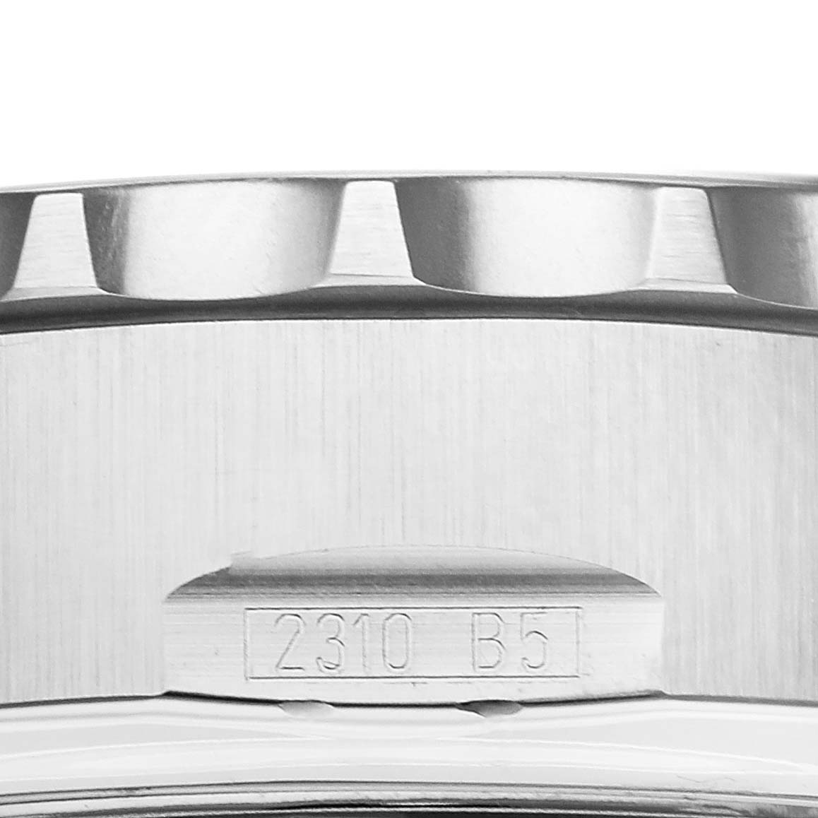The image shows a close-up of the side bezel and casing of a Breitling Professional Series A78365 Men's Stainless Steel Silver Dial A78365 Men's Stainless Steel Silver Dial watch, with a visible engraved serial number.
