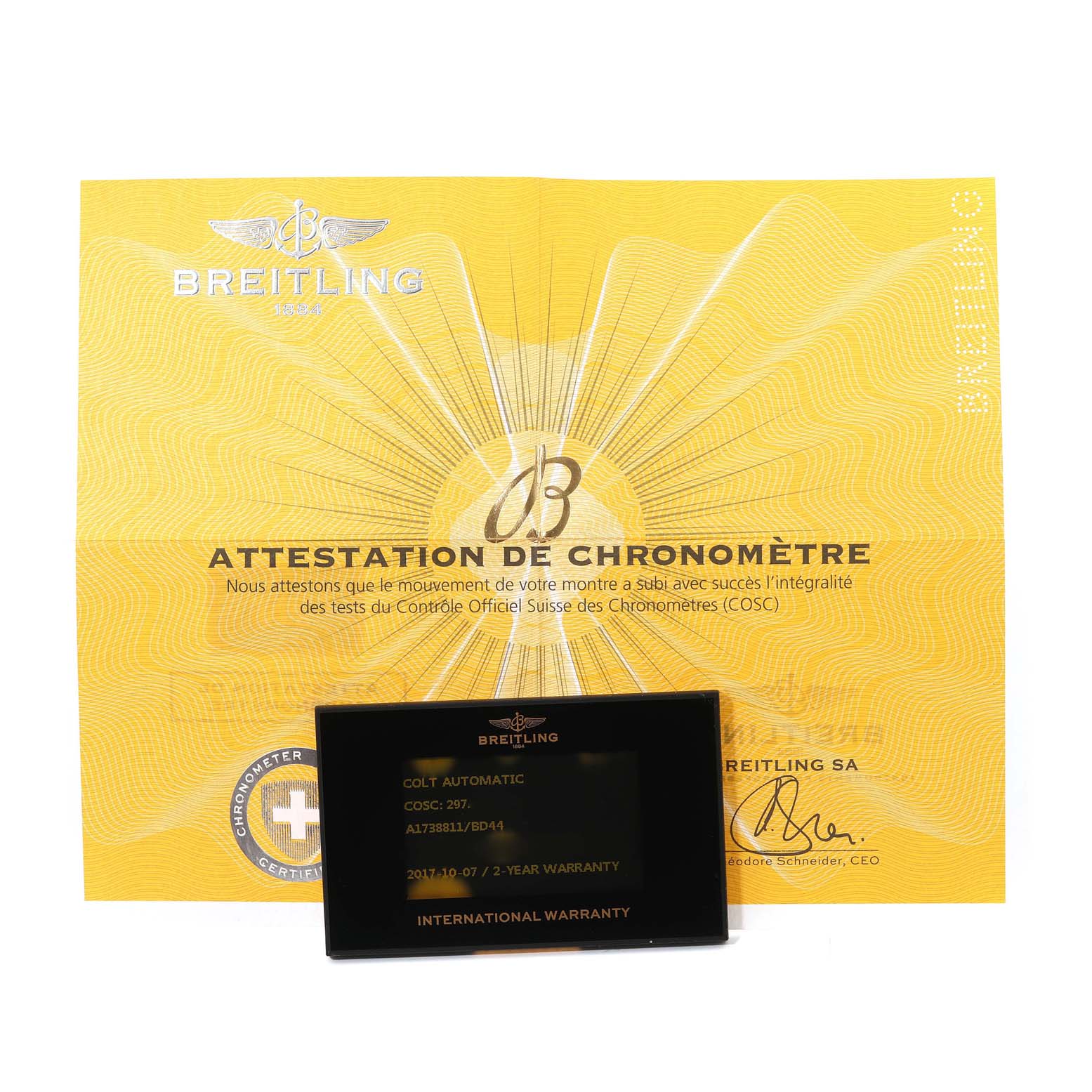This image shows the warranty card and chronometer certification for the Breitling Colt A1738811/BD44 Men's Stainless Steel Black Dial A1738811/BD44 Men's Stainless Steel Black Dial watch.