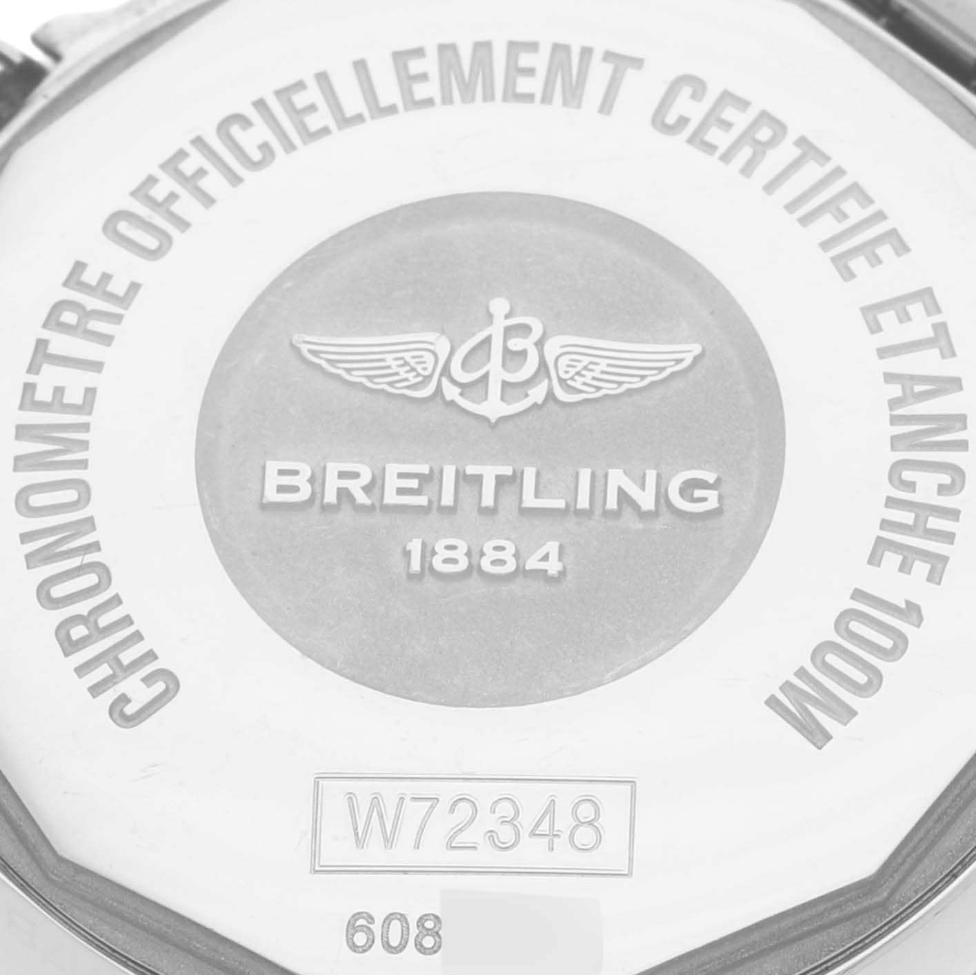 This is the back casing of the Breitling W7234812/A784 Women
s Stainless Steel Mother of Pearl Dial W7234812/A784 Women
s Stainless Steel Mother of Pearl Dial Galactic 29 Mother of Pearl Dial Steel Ladies Watch W72348, showing the brand engraving and model number.