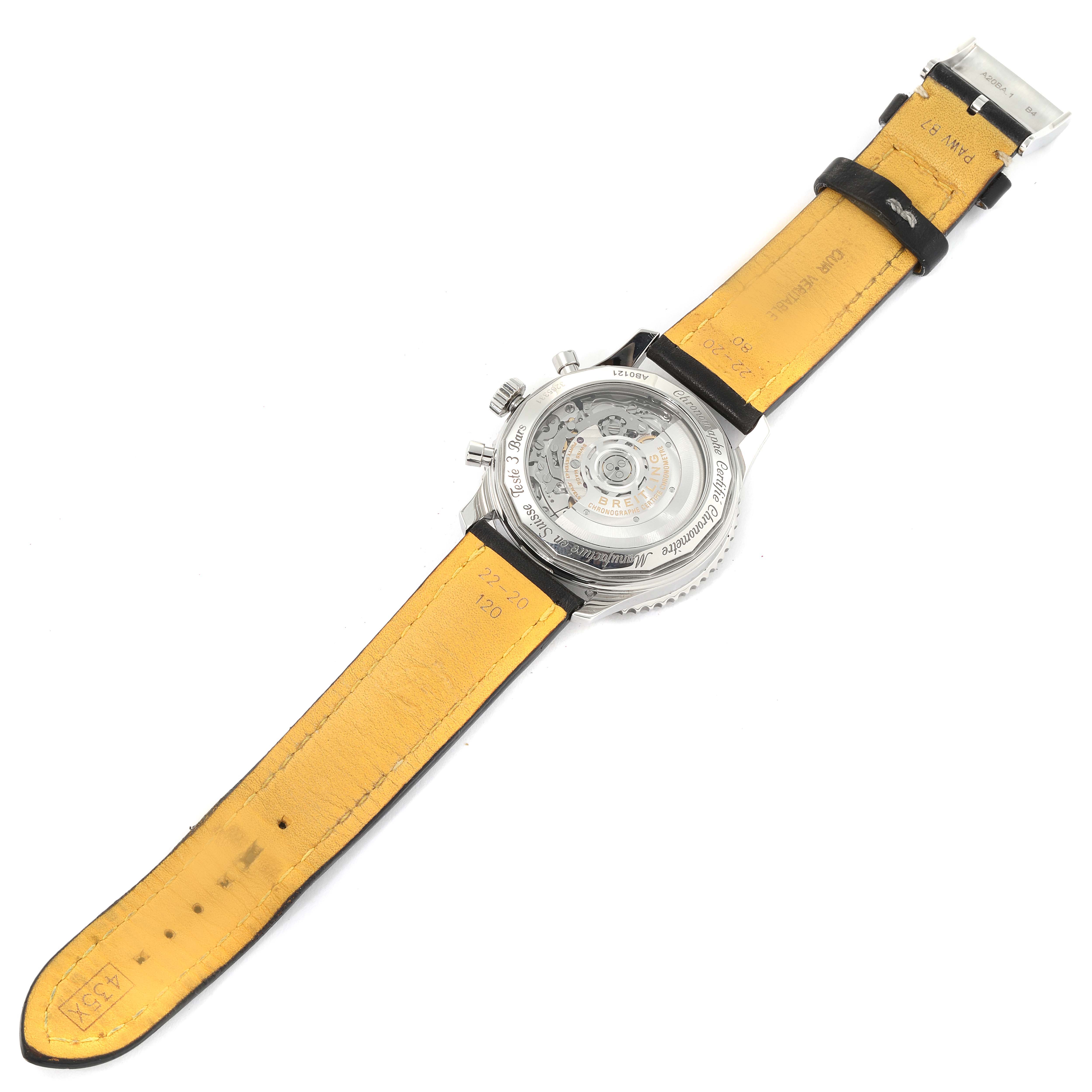 The image shows the underside and back of a Breitling Navitimer AB0121 Men's Stainless Steel Black Dial AB0121 Men's Stainless Steel Black Dial watch, featuring the open case back and the leather strap.