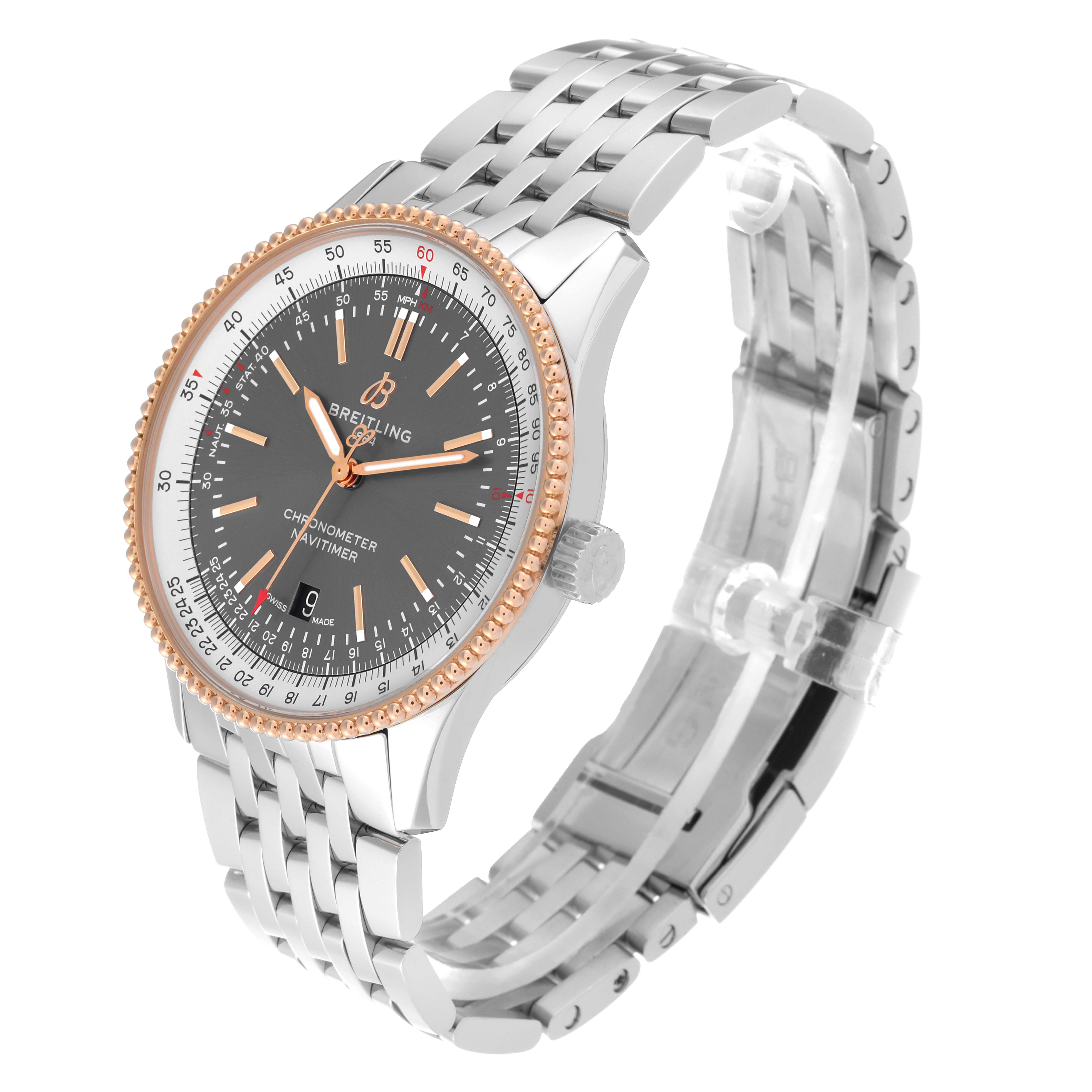 The image shows a Breitling Navitimer U17326211M1A1 Men
s Steel and Gold (two tone) Grey Dial U17326211M1A1 Men
s Steel and Gold (two tone) Grey Dial watch from a slight side angle, showcasing the face, bezel, crown, and metal bracelet.