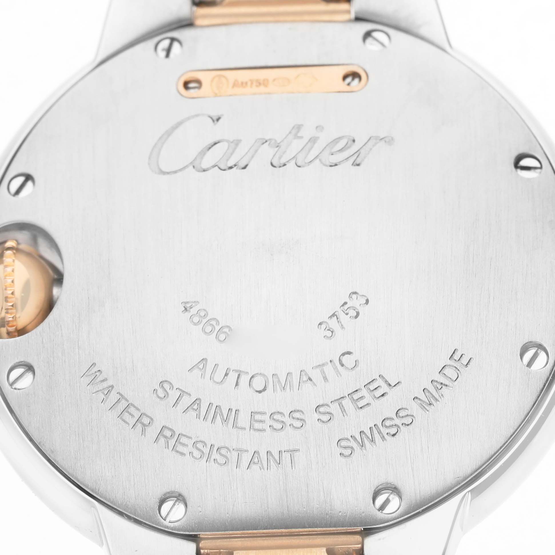 The image shows the back of a Cartier Ballon Bleu W3BB0006 Women's Steel and Gold (two tone) Silver Dial watch, highlighting the brand logo and specifications engraved on the case back.