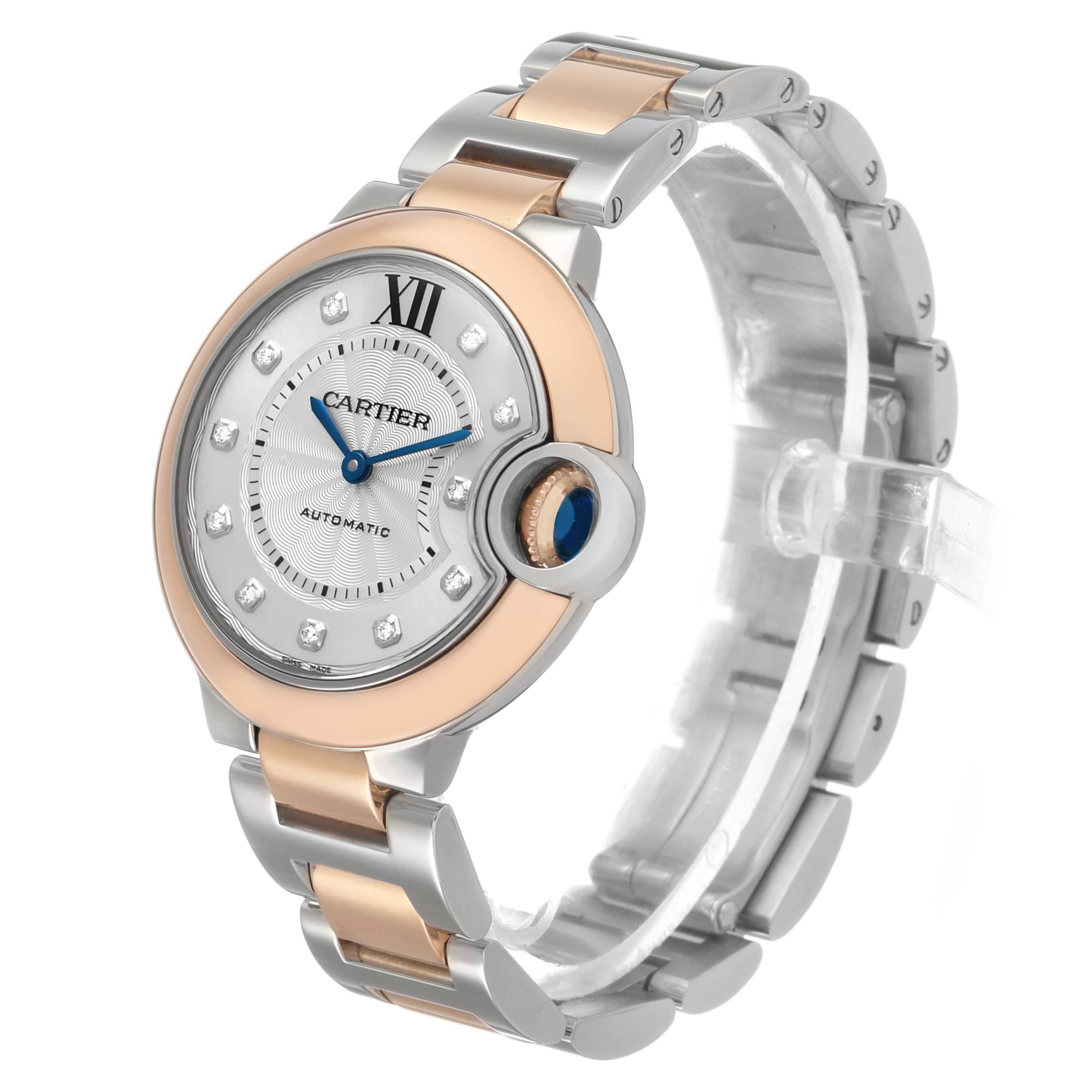 The Cartier Ballon Bleu W3BB0006 Women's Steel and Gold (two tone) Silver Dial watch is shown at a three-quarter angle, displaying the face, crown, and part of the bracelet.
